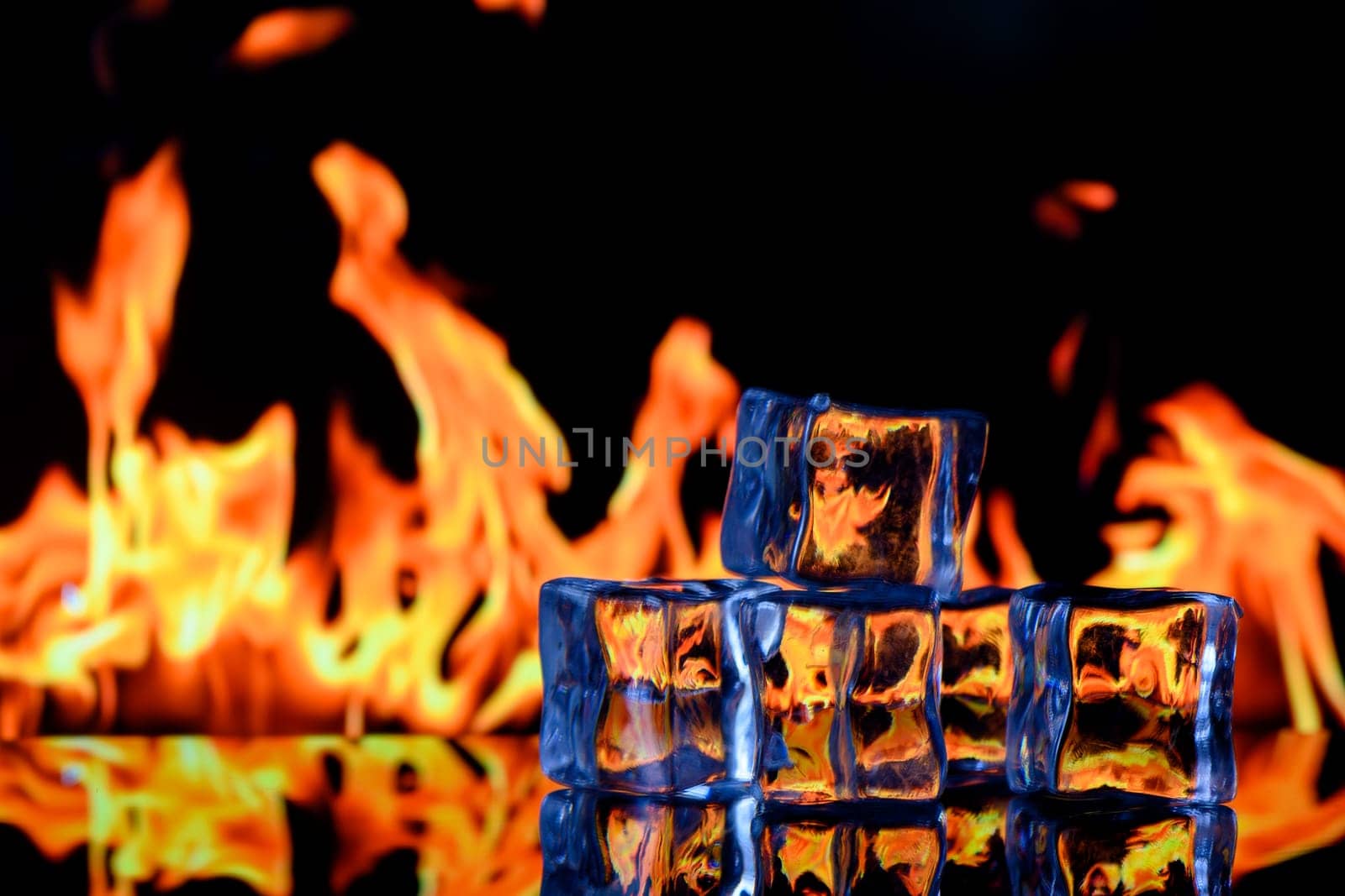 ice cubes on a black background in flames 5