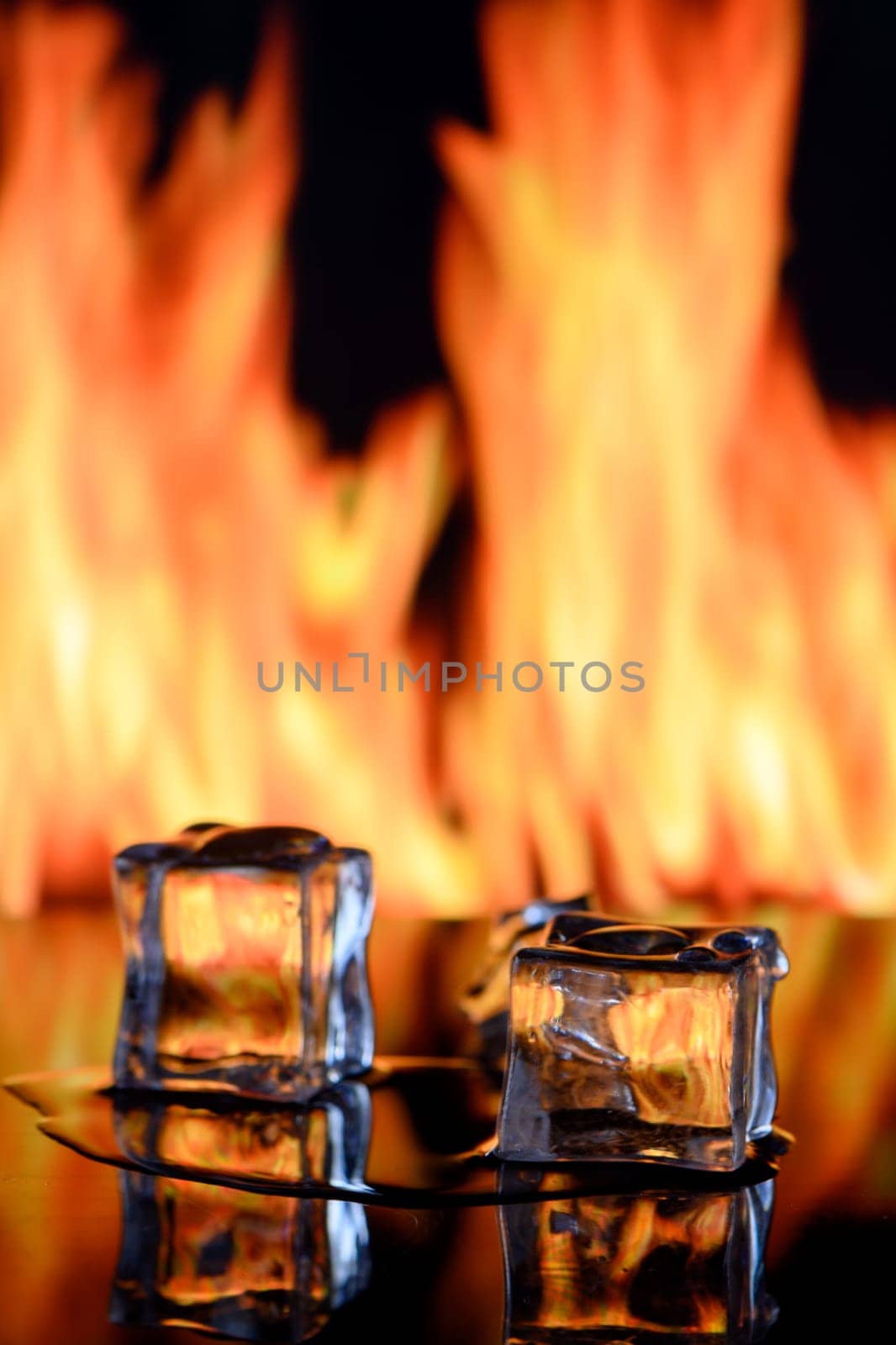 ice cubes on fire background for alcoholic cocktail 1 by Mixa74