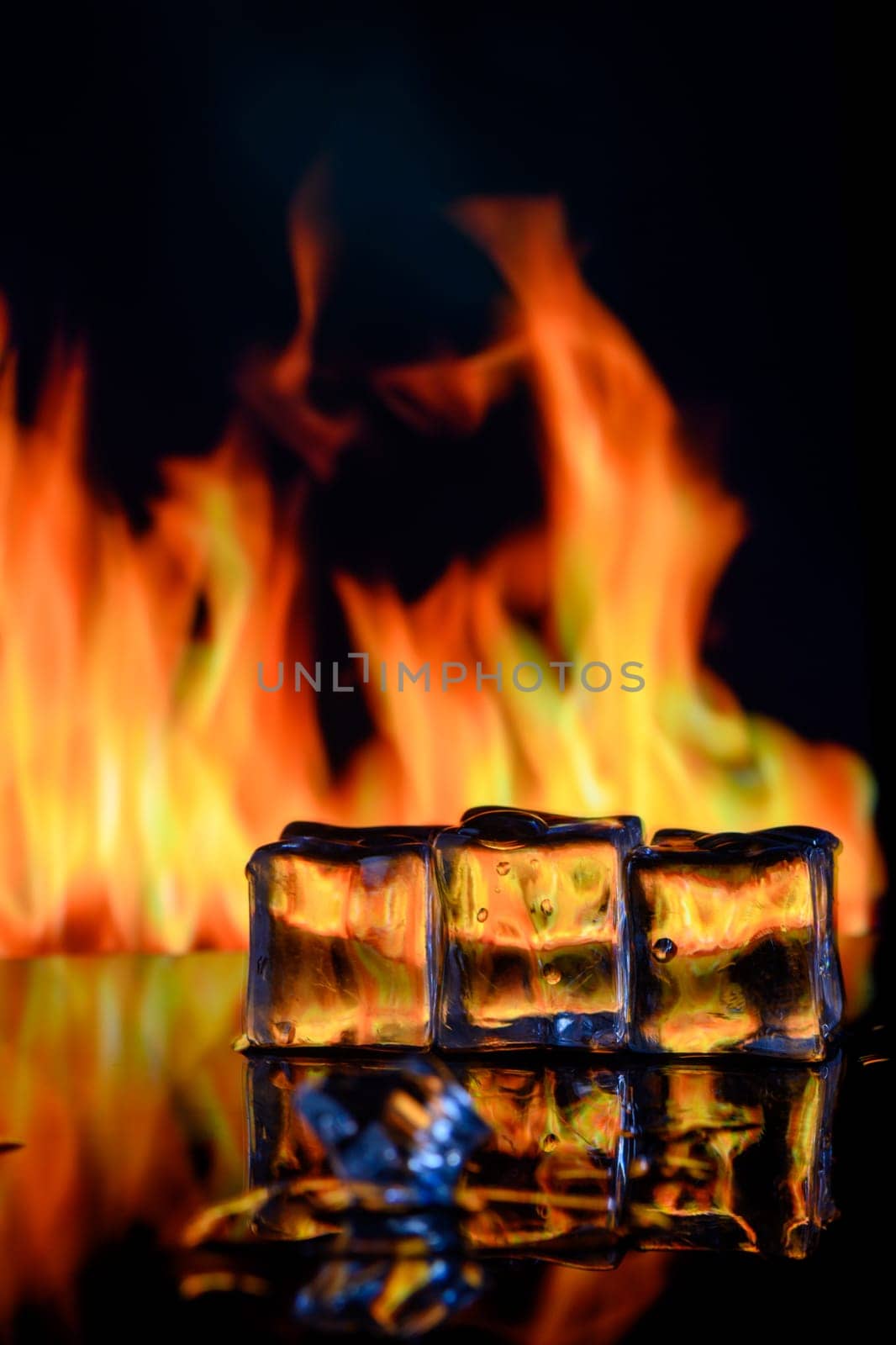 fire and ice cubes on a black background, place under the text 3 by Mixa74