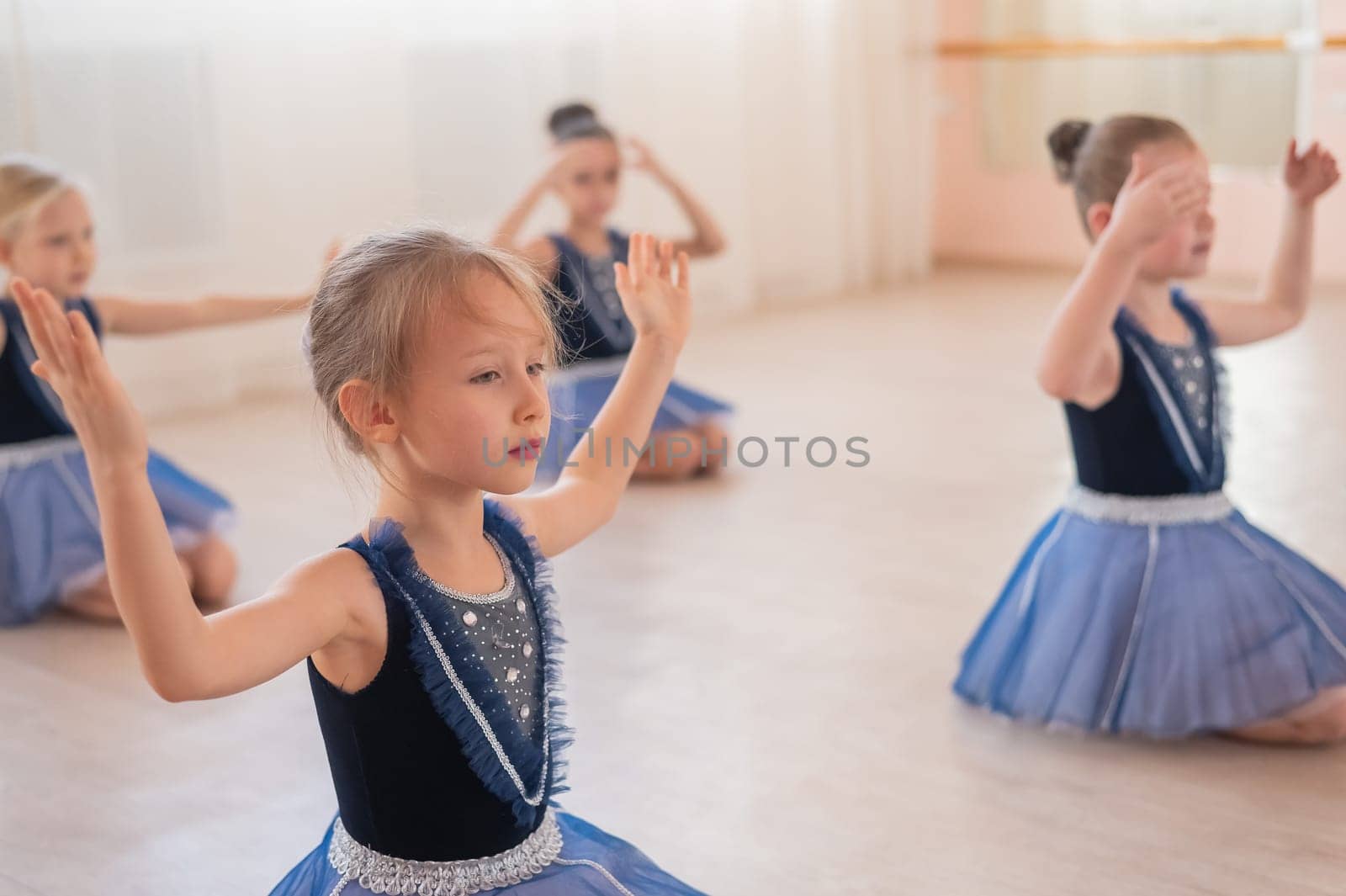 Little ballerinas perform at a dance school