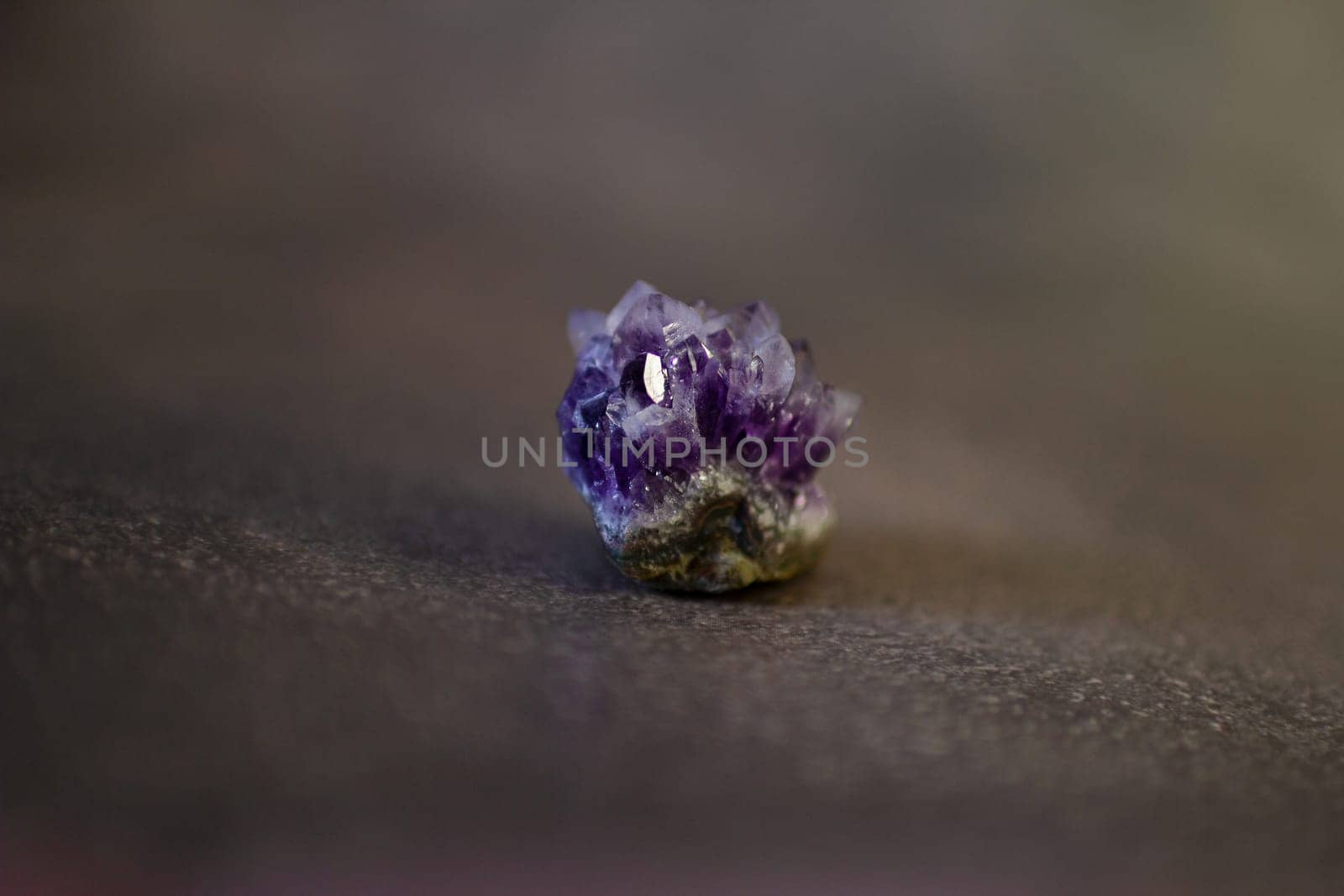 Violet amethyst quartz crystals on black background. High quality photo