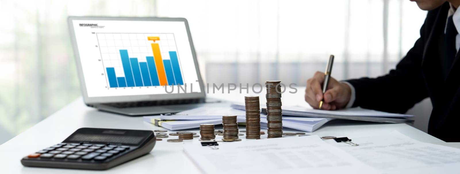 Business intelligence analyst use BI software on laptop with stack coin. Shrewd by biancoblue