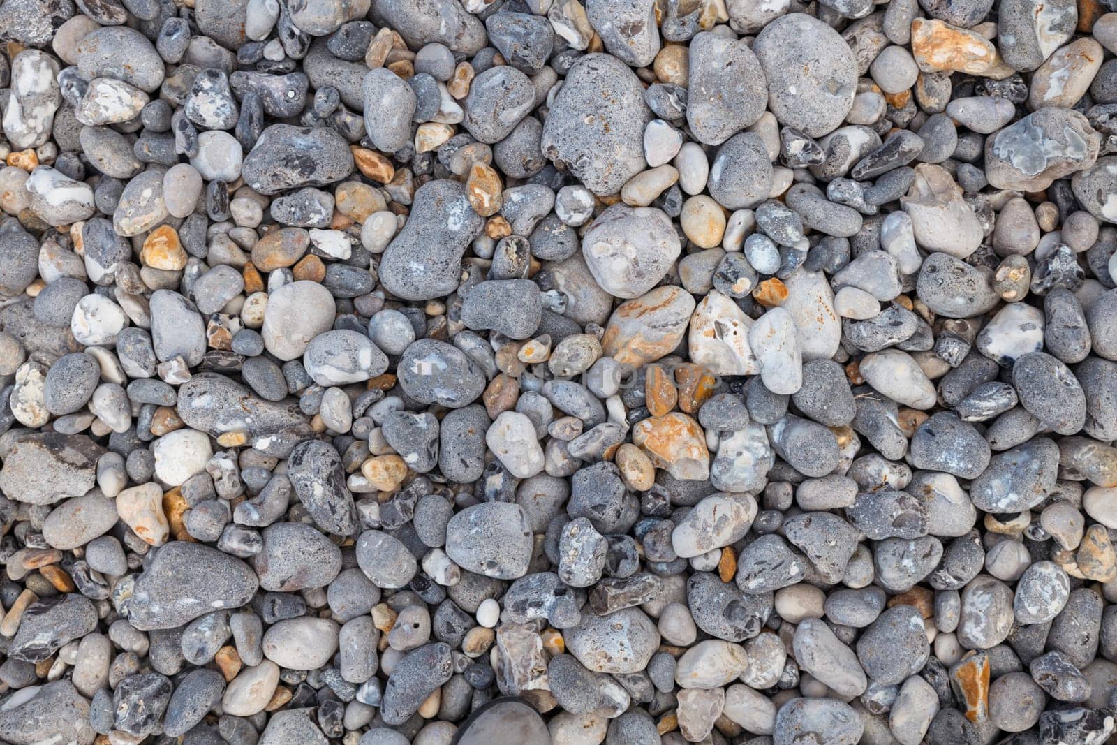 background of different types of gravel and gravel and mainly light gray and brown