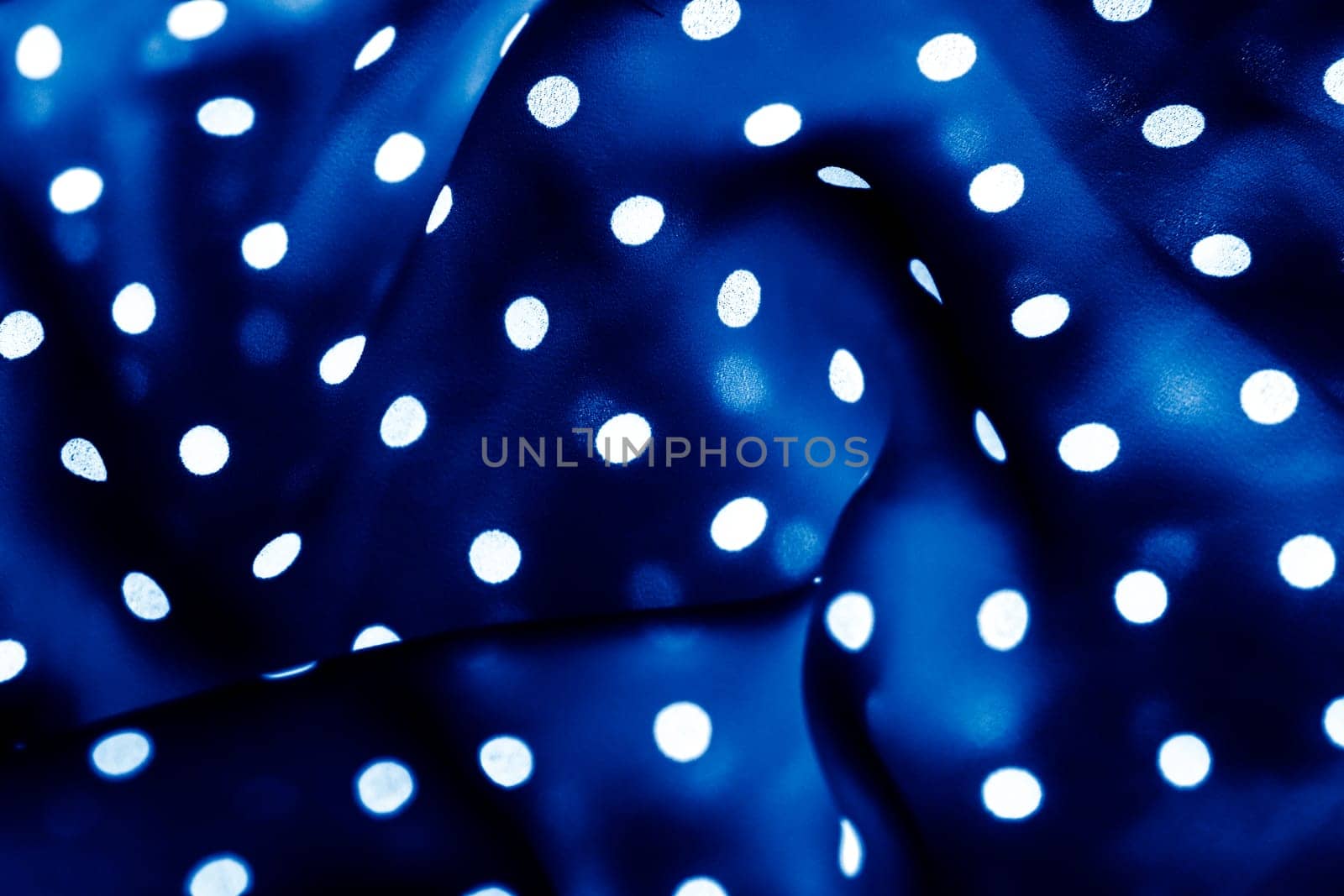 Fashion design, interior decor and vintage material concept - Classic polka dot textile background texture, white dots on blue luxury fabric design pattern