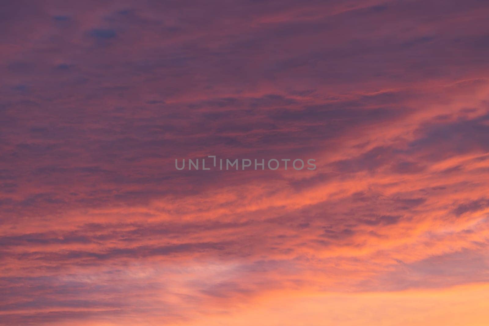 Low angle view to evening sky with dramatic clouds