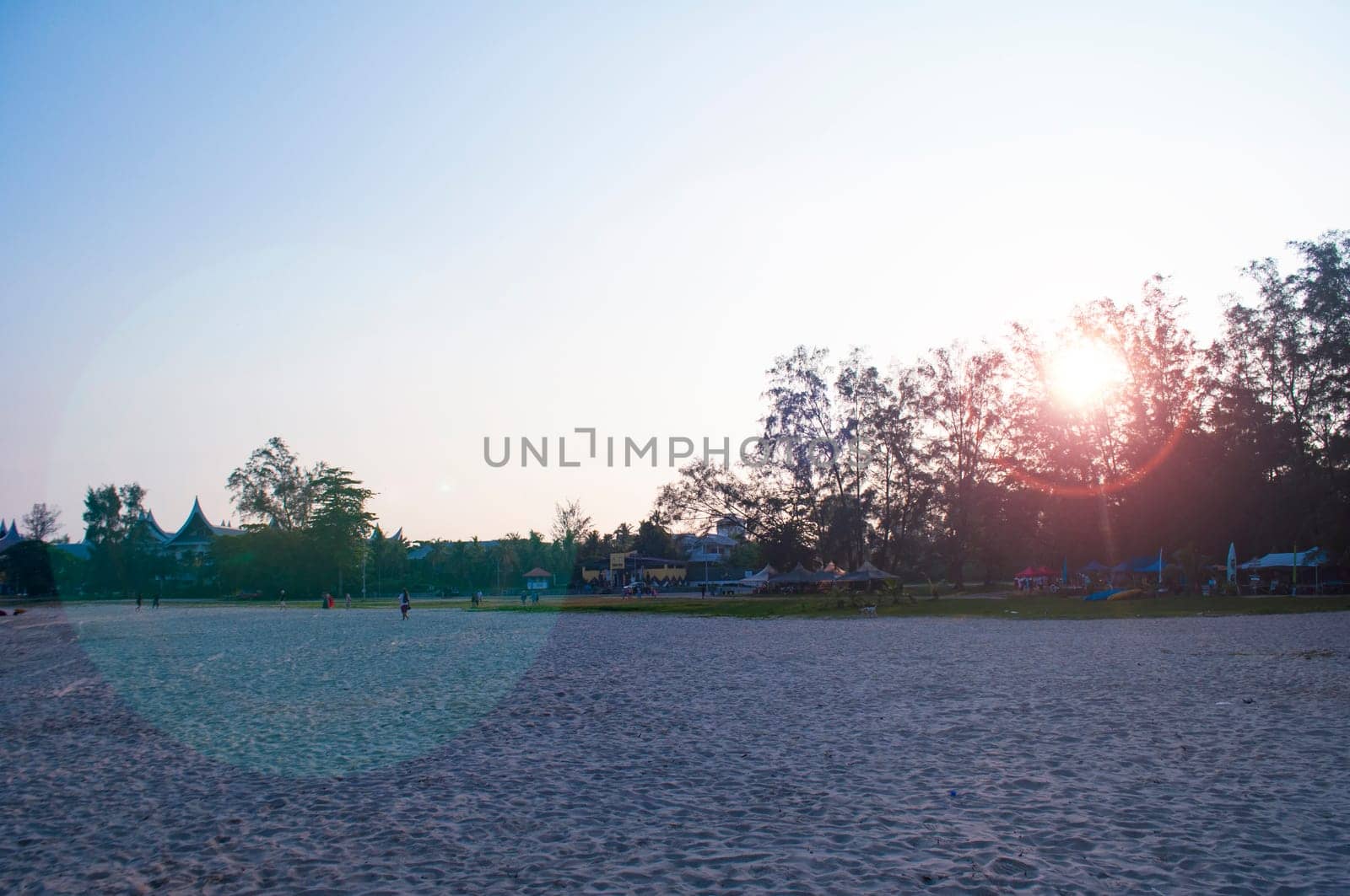 Evening beach outing with shining light background.