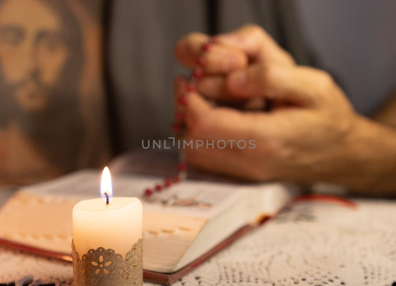 Culture of faith.Prayers of faith. Concepts of belief and religion.Hands of a young man offering prayer.