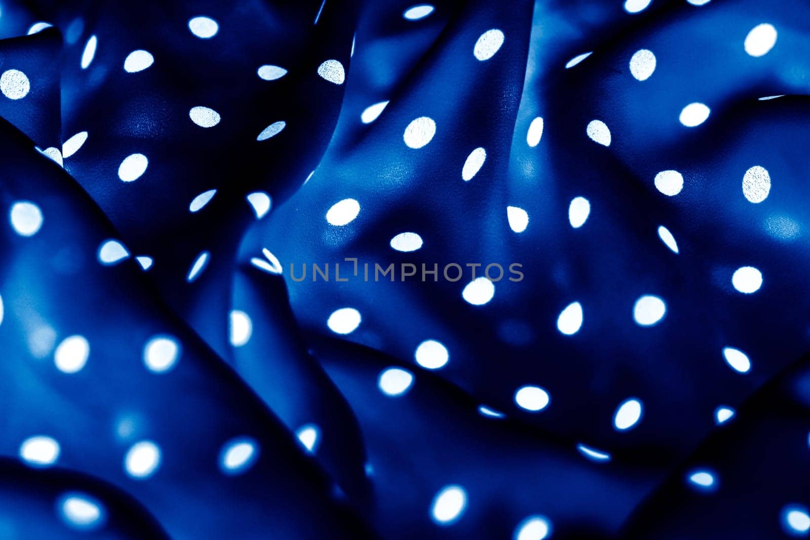 Fashion design, interior decor and vintage material concept - Classic polka dot textile background texture, white dots on blue luxury fabric design pattern