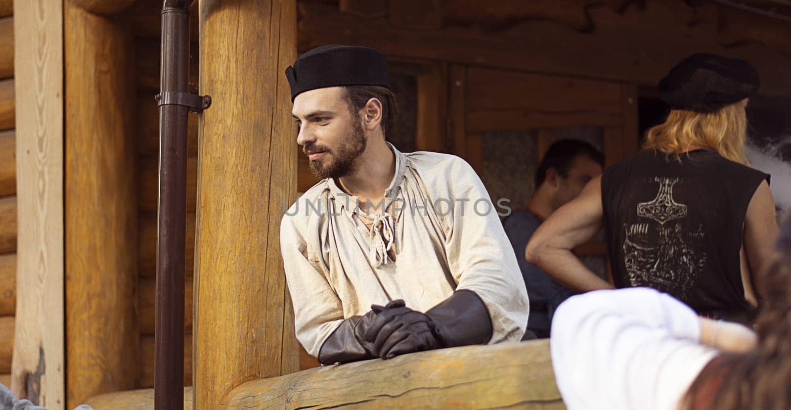 Portrait of a dark-haired man in a headdress. by VeronikaAngo