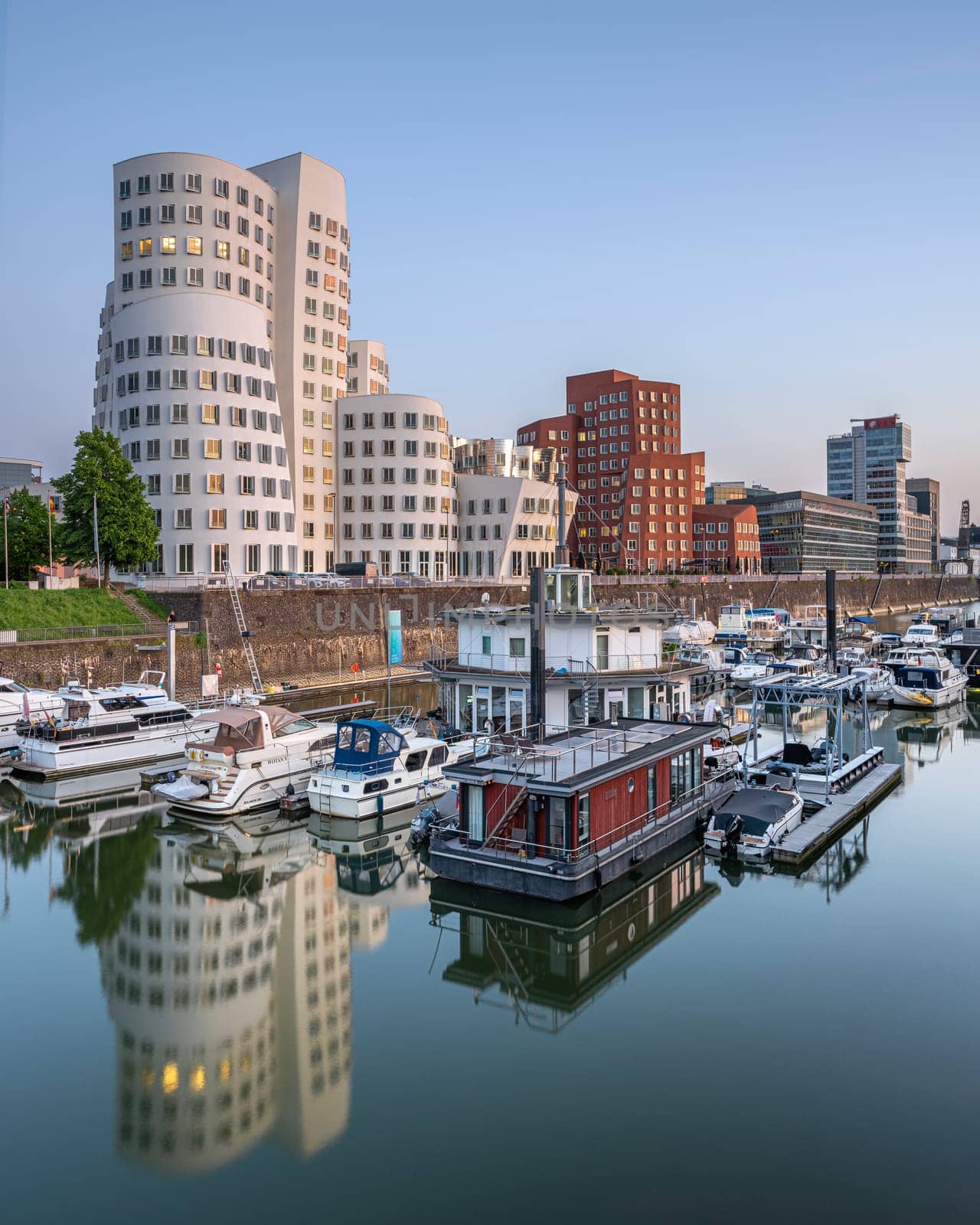 DUSSELDORF, GERMANY - MAY 25, 2023: Panoramic image of modern buildings in the media harbor of Dusseldorf on May 25, 2023 in Germany, Europe