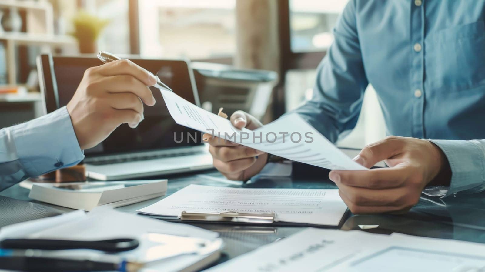 Two people are sitting at a desk with papers and a pen by AI generated image.