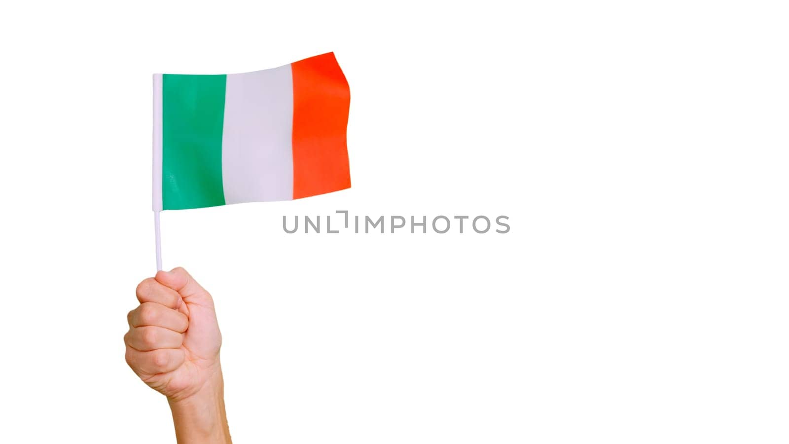 Photo of wind waving a italian pennant holding by a hand