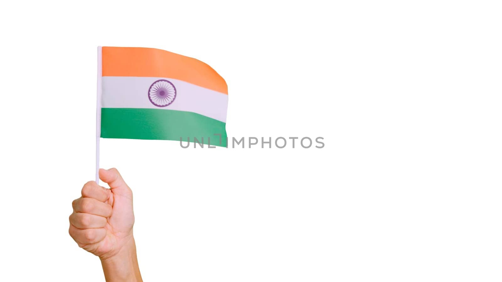 Photo of wind waving a indian pennant holding by a hand