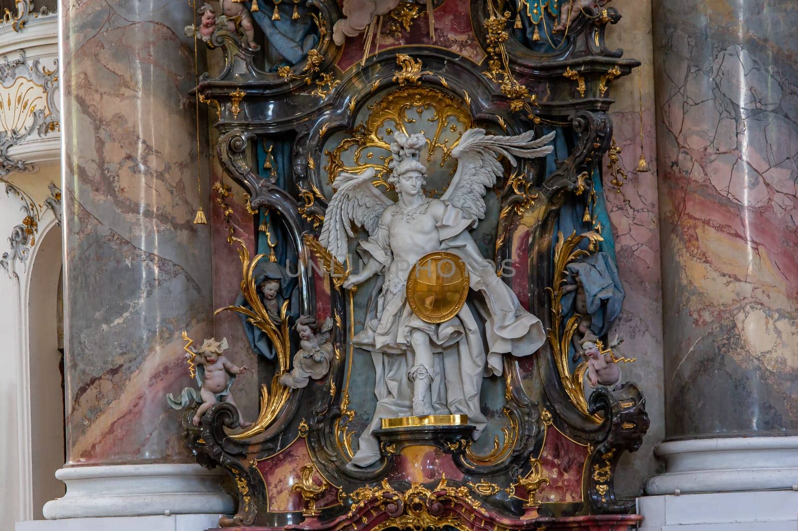 OTTOBEUREN, BAVARIA, GERMANY, JUNE 04, 2022 : Rococo stuccowork statues, by various anonymous artists, 18th century,  in  Ottobeuren abbey basilica