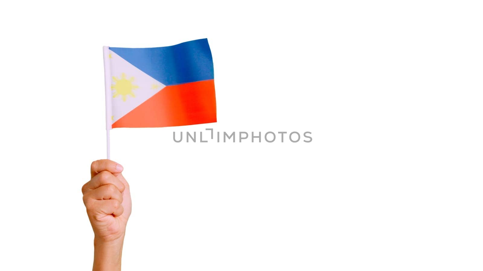 Photo of wind waving a philippine pennant holding by a hand. Slow Motion video