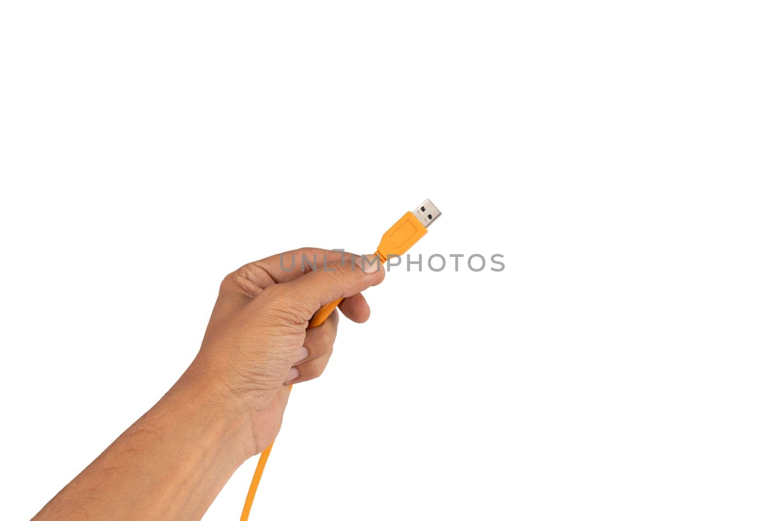 Male hand holding an orange usb cable isolated on white background by TropicalNinjaStudio