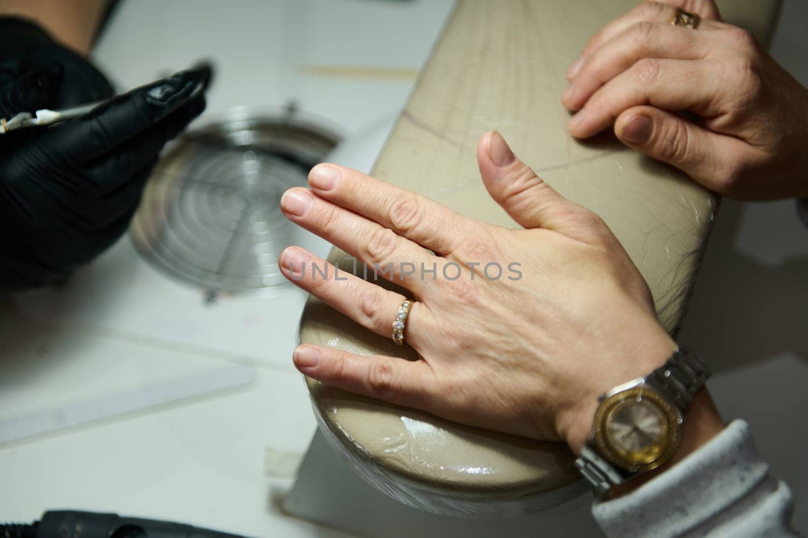 Close-up of manicure process in a beauty salon by artgf