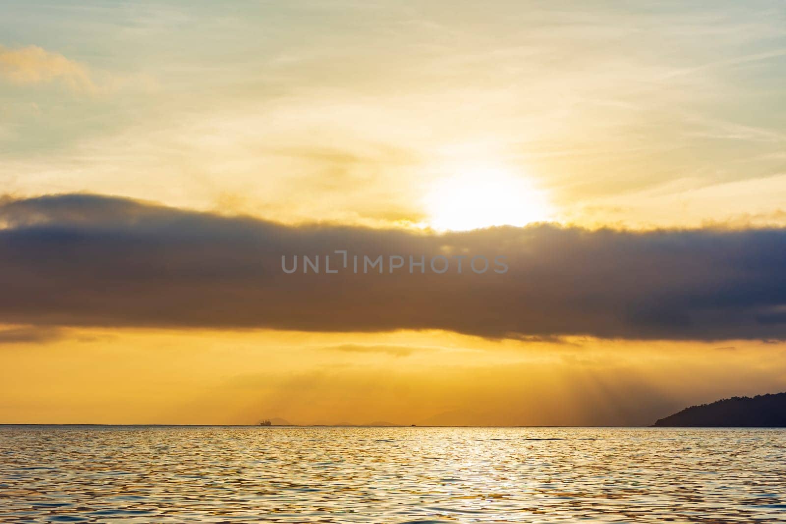 Sunset over the sea of ​​Ilhabela island on the coast of Sao Paulo