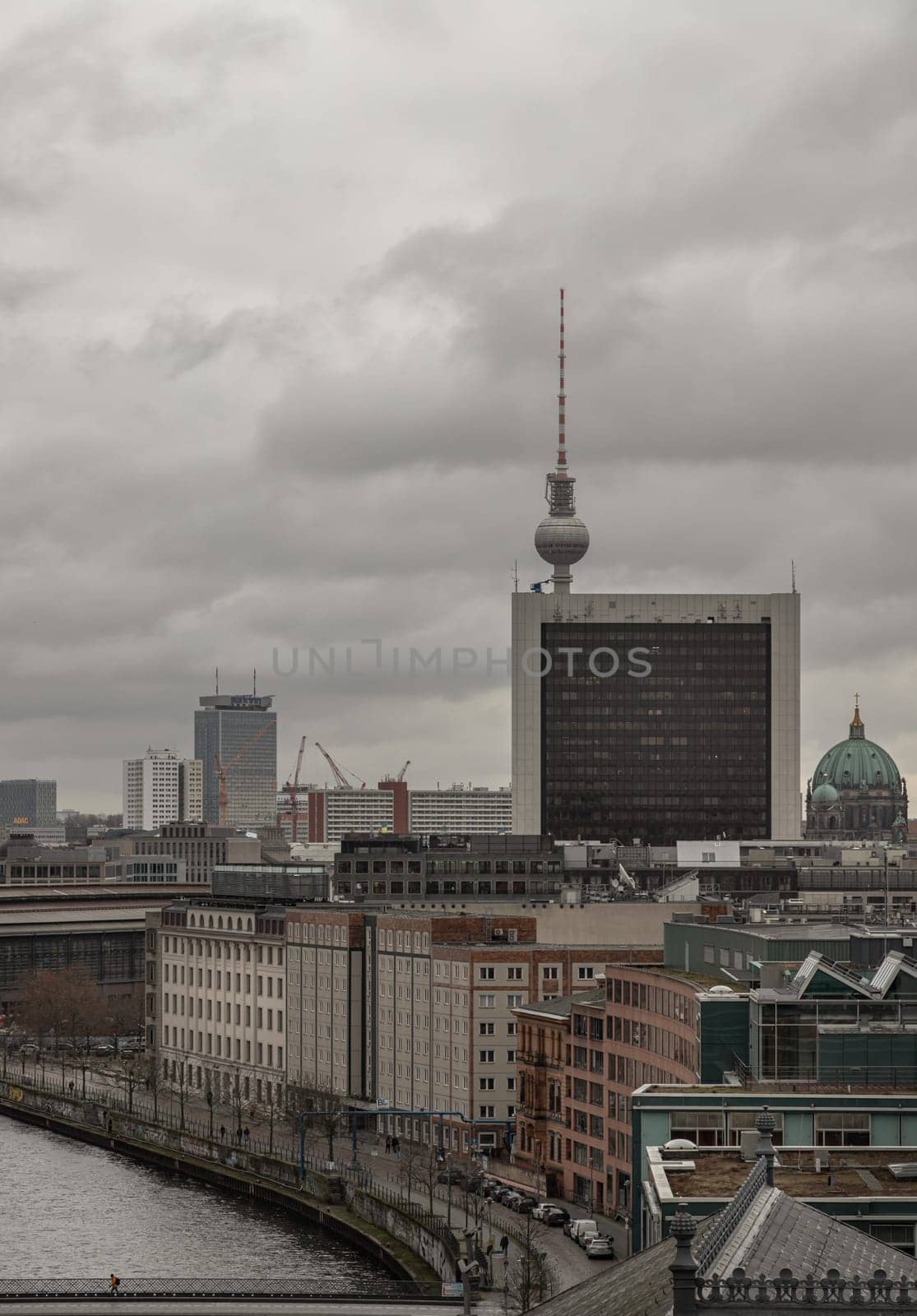 Berlin, Germany - Dec 20, 2023 - Berlin cityscape view from above of Reichstag building with Berlin Television Tower, Berliner Dom, Marschall Bridge, River Spree and buildings at the downtown Berlin. a major tourist attraction of the berlin city, Space for text, Selective focus.