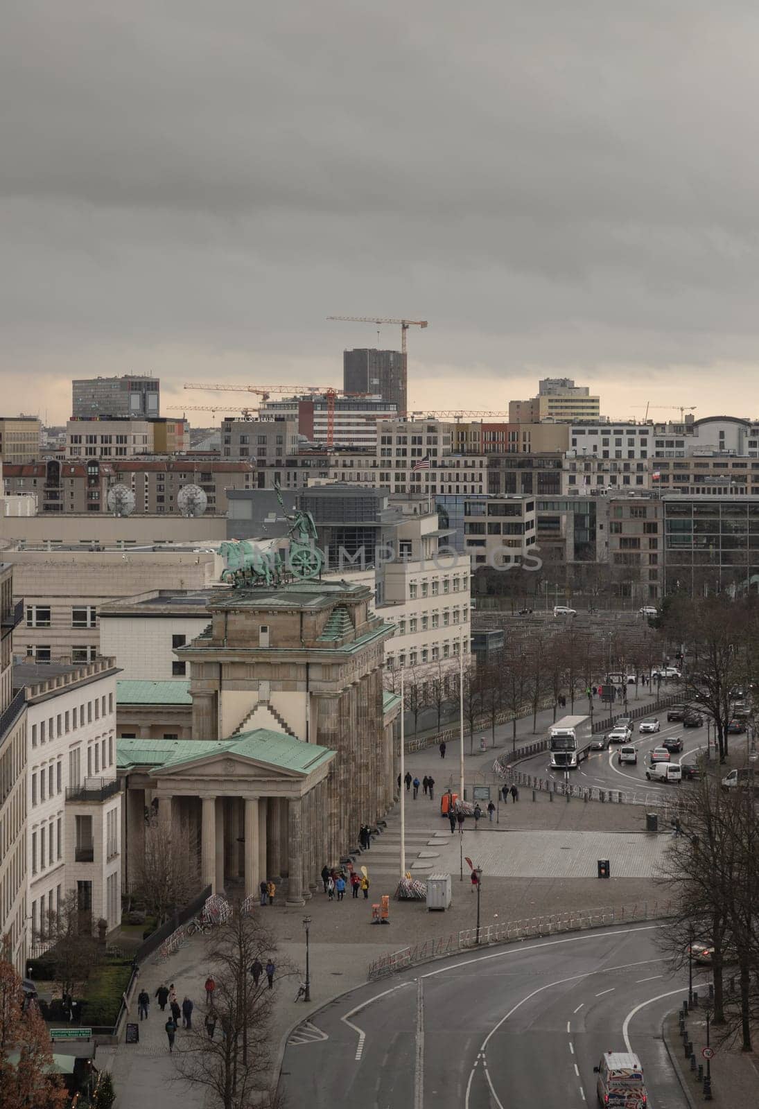 Berlin, Germany - Dec 20, 2023 - Berlin cityscape view from above of Reichstag building with the Brandenburg Gate and the Eberstrasse and buildings at the downtown Berlin. a major tourist attraction of the berlin city, Space for text, Selective focus.