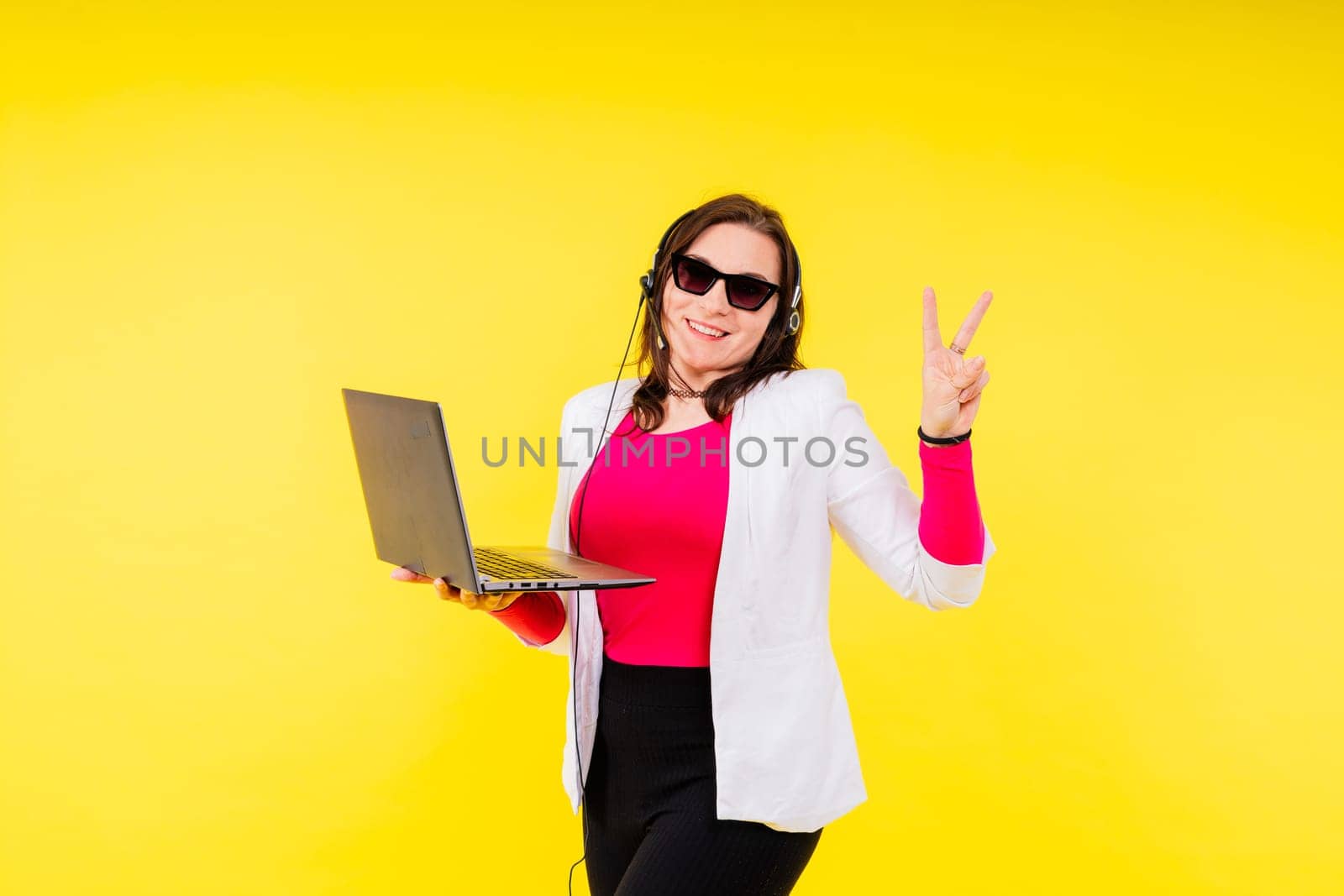 Young smiling happy chubby overweight plus size big fat fit woman work on laptop pc computer by Zelenin