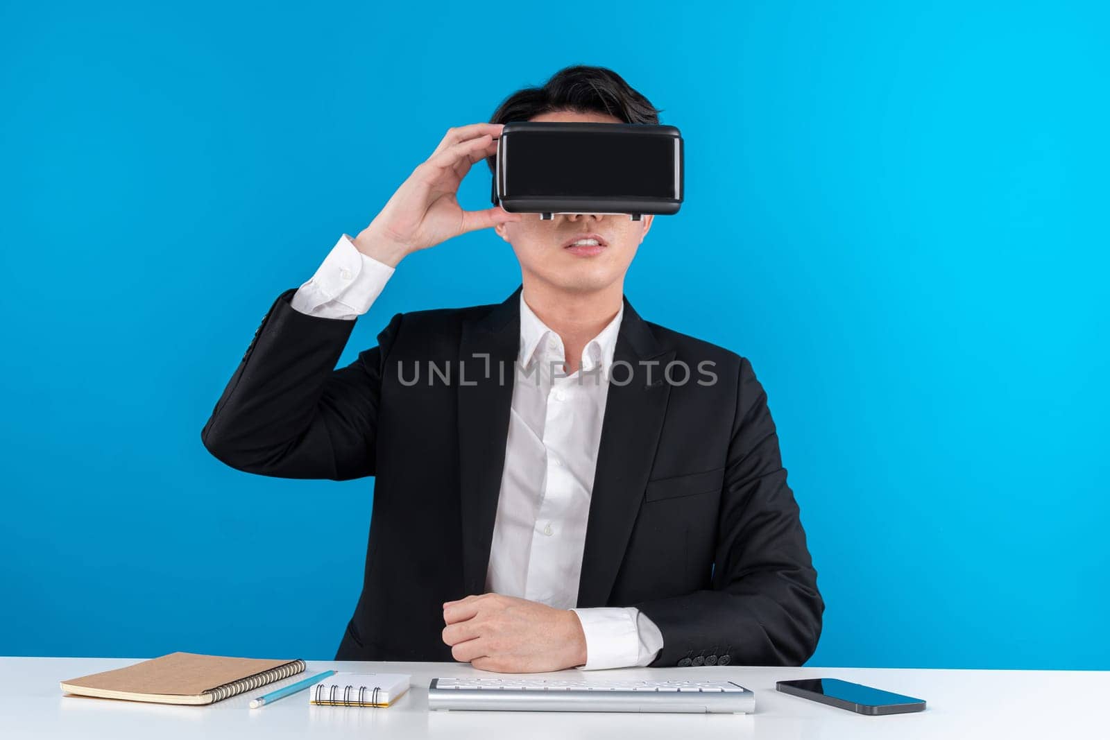 Businessman looking VR connecting meta analyzing business world. Contrivance. by biancoblue