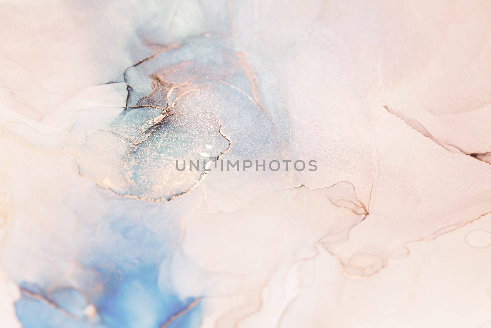 A closeup shot of a delicate abstract painting featuring a blend of soft blue, pink, and white colors with subtle gold accents.