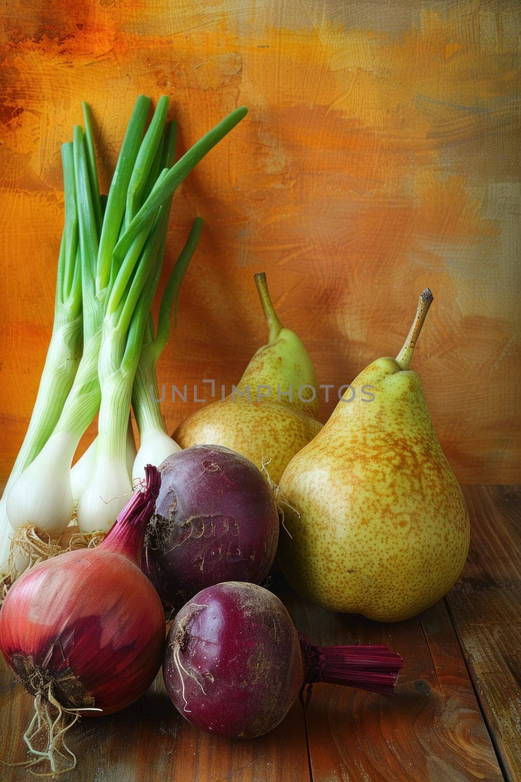 Wooden table with onions, pears, and green onions as decorative display for farmtotable restaurant or farmers market booth by Vichizh