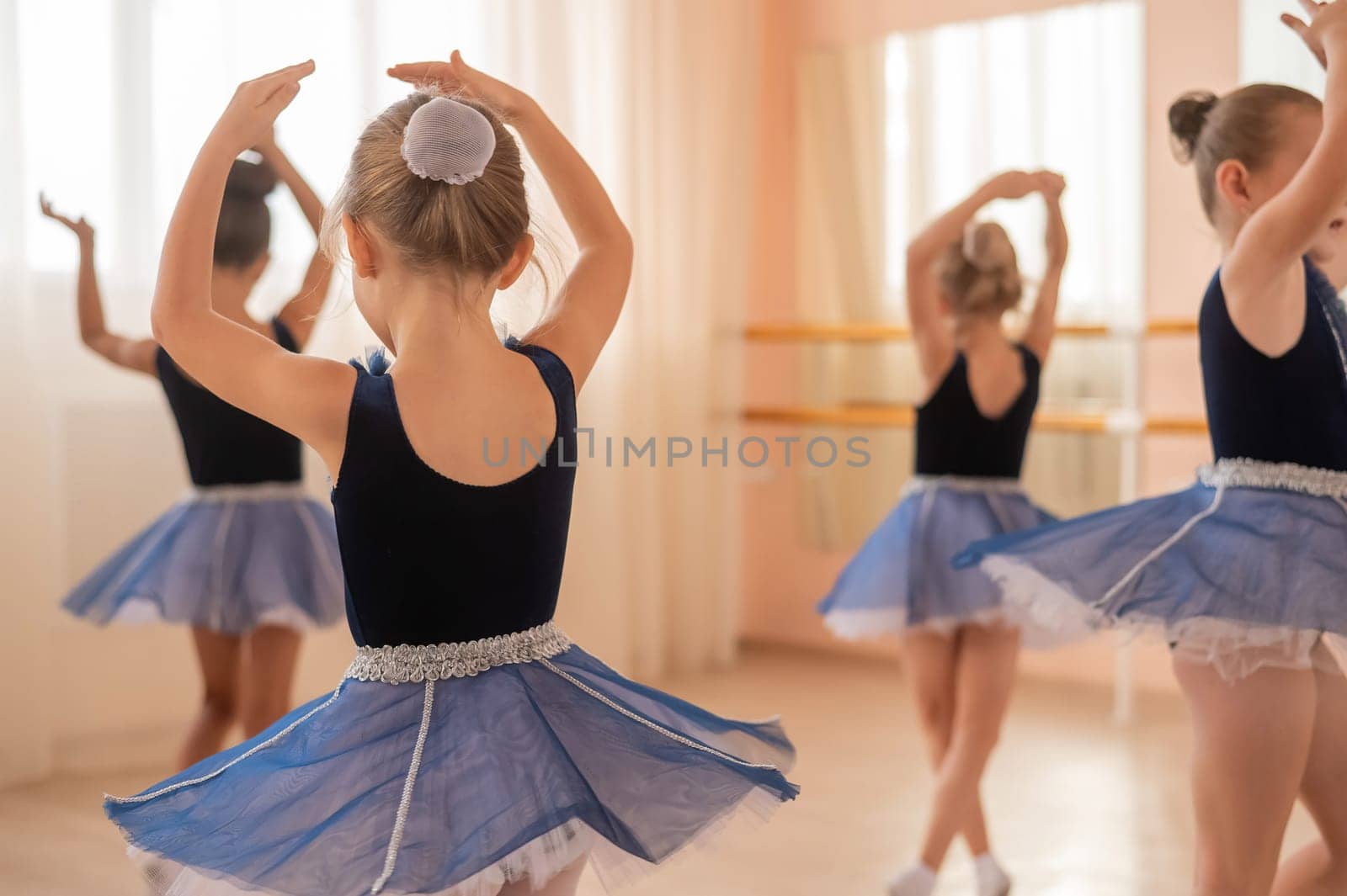 Little ballerinas perform at a dance school. by mrwed54