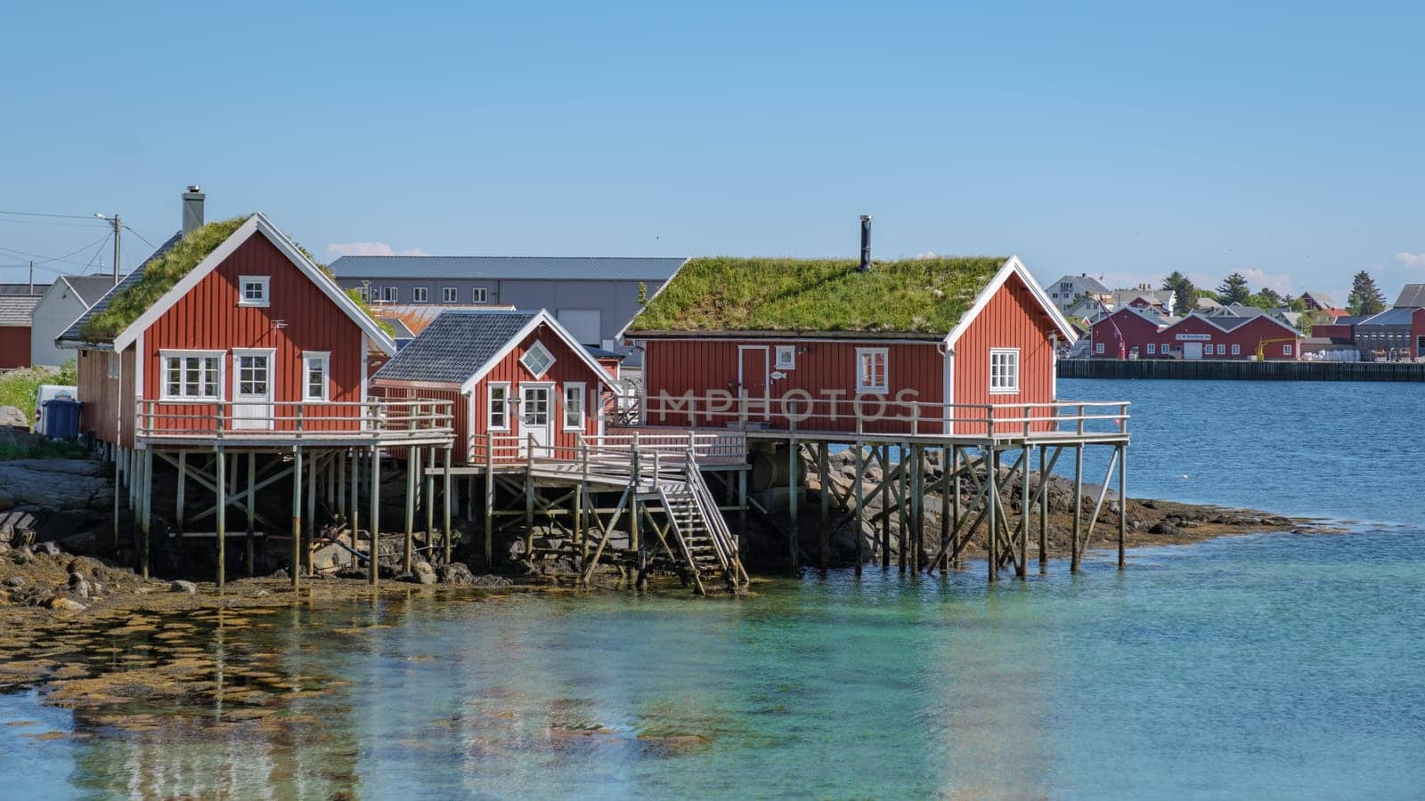 Red Cabins on Stilts in Norway, Reine, Lofoten, Norway by fokkebok