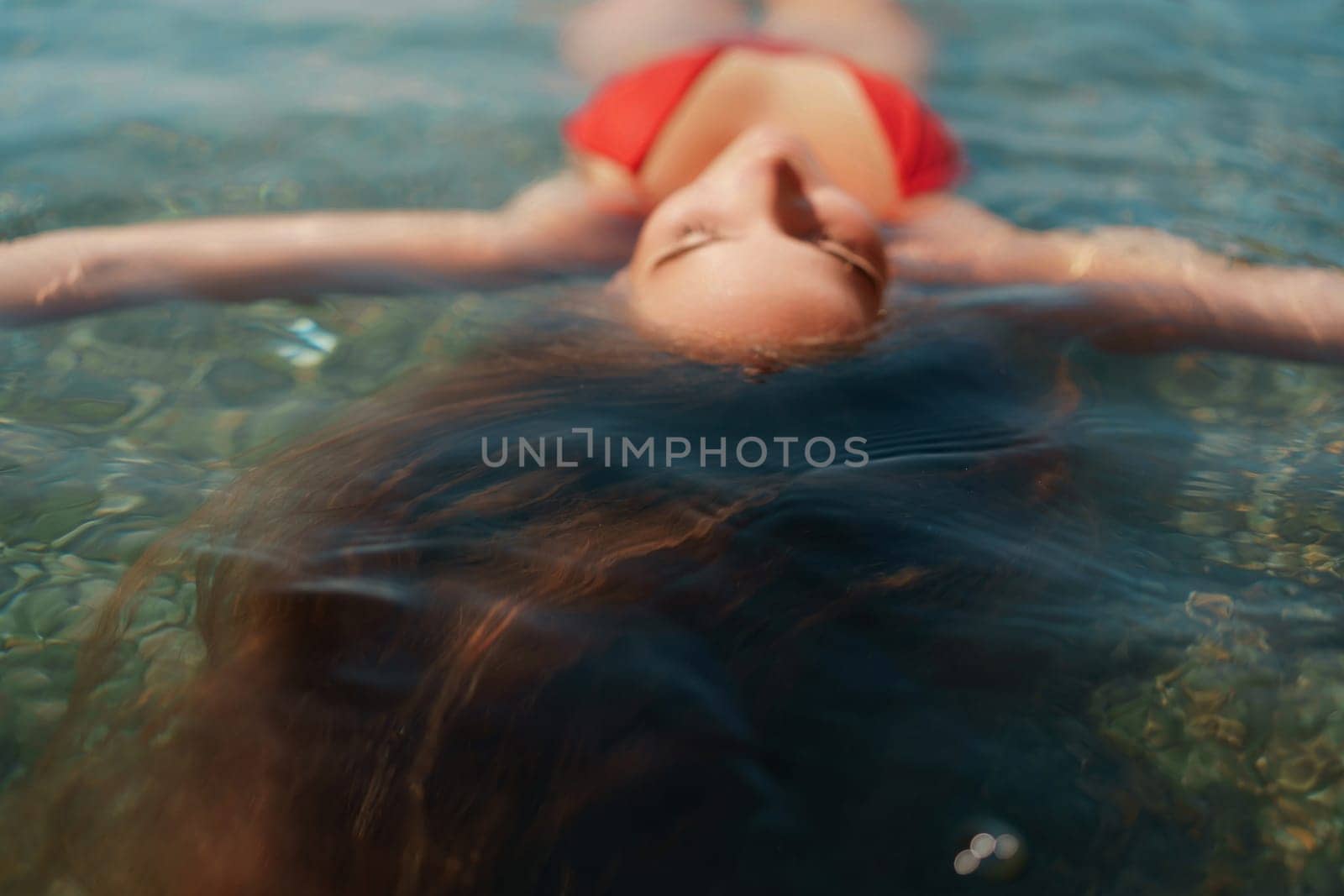 Happy woman sea relaxing floating in transparent sea water on summer holiday. Travel leisure recreation lifestyle, female in nature. by Matiunina