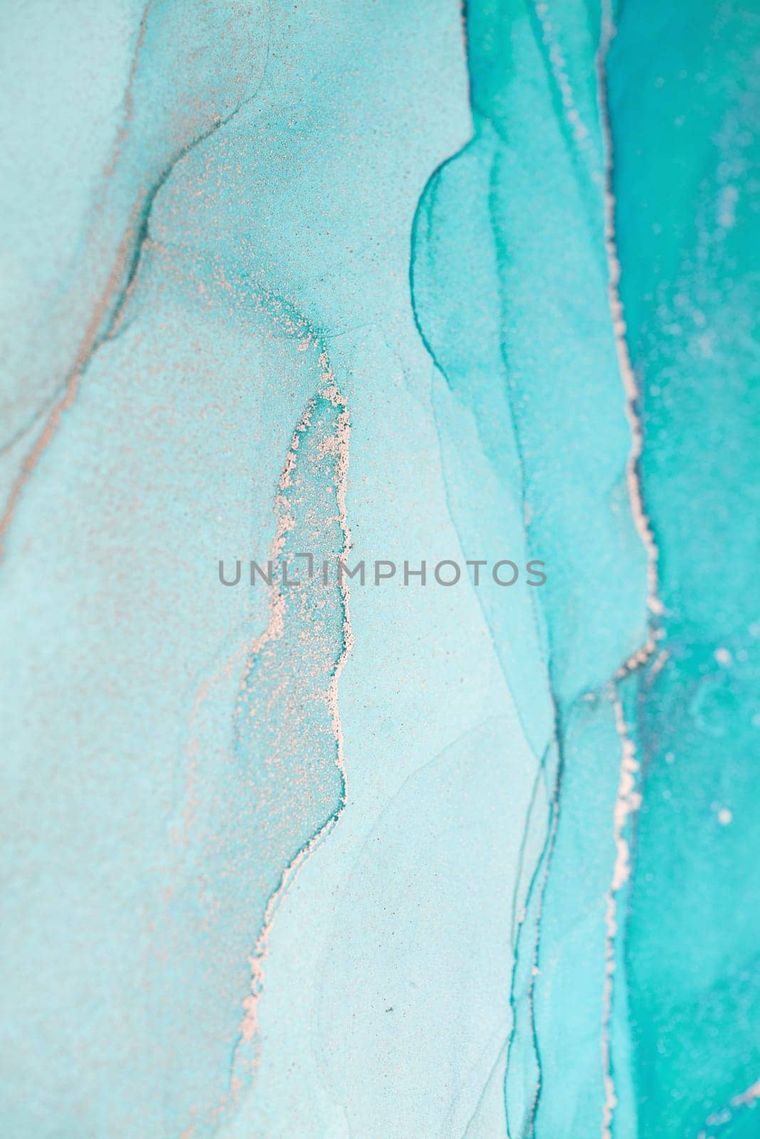 An abstract painting featuring swirling shades of aqua with gold accents.