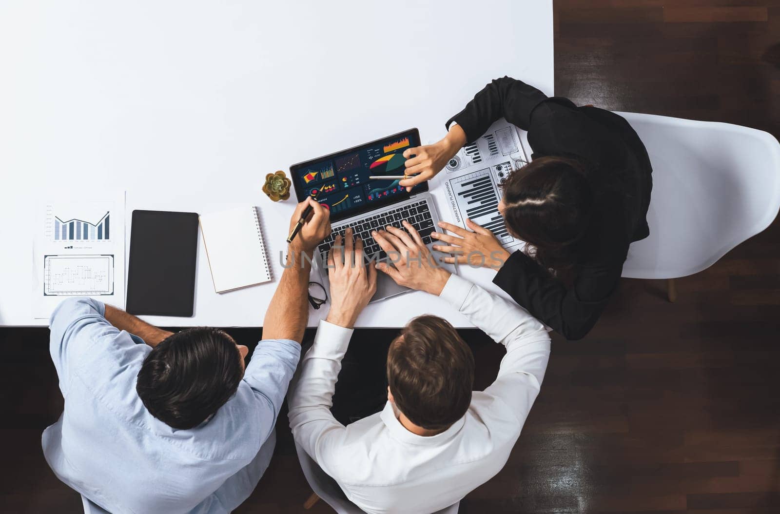 Group of office worker and businesspeople working on business financial data analysis. Empty space with editable blank background meeting table for customer design. Prudent
