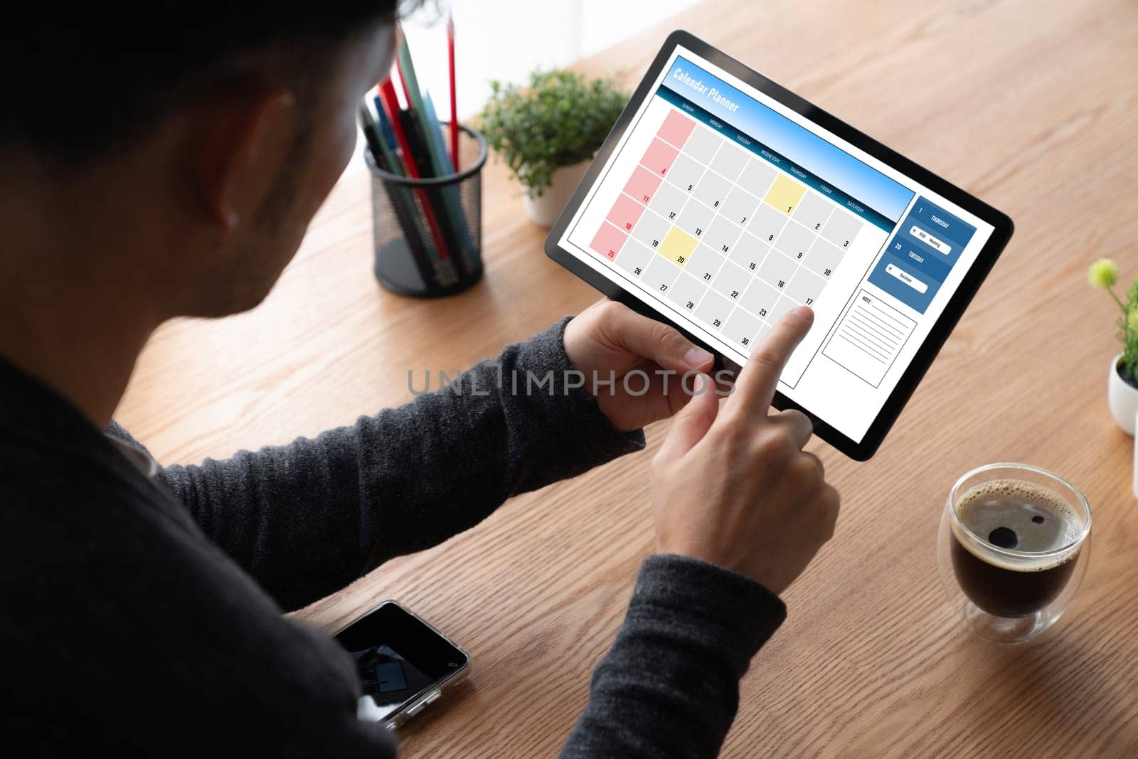 Calendar on computer software application for modish schedule planning for personal organizer and online business