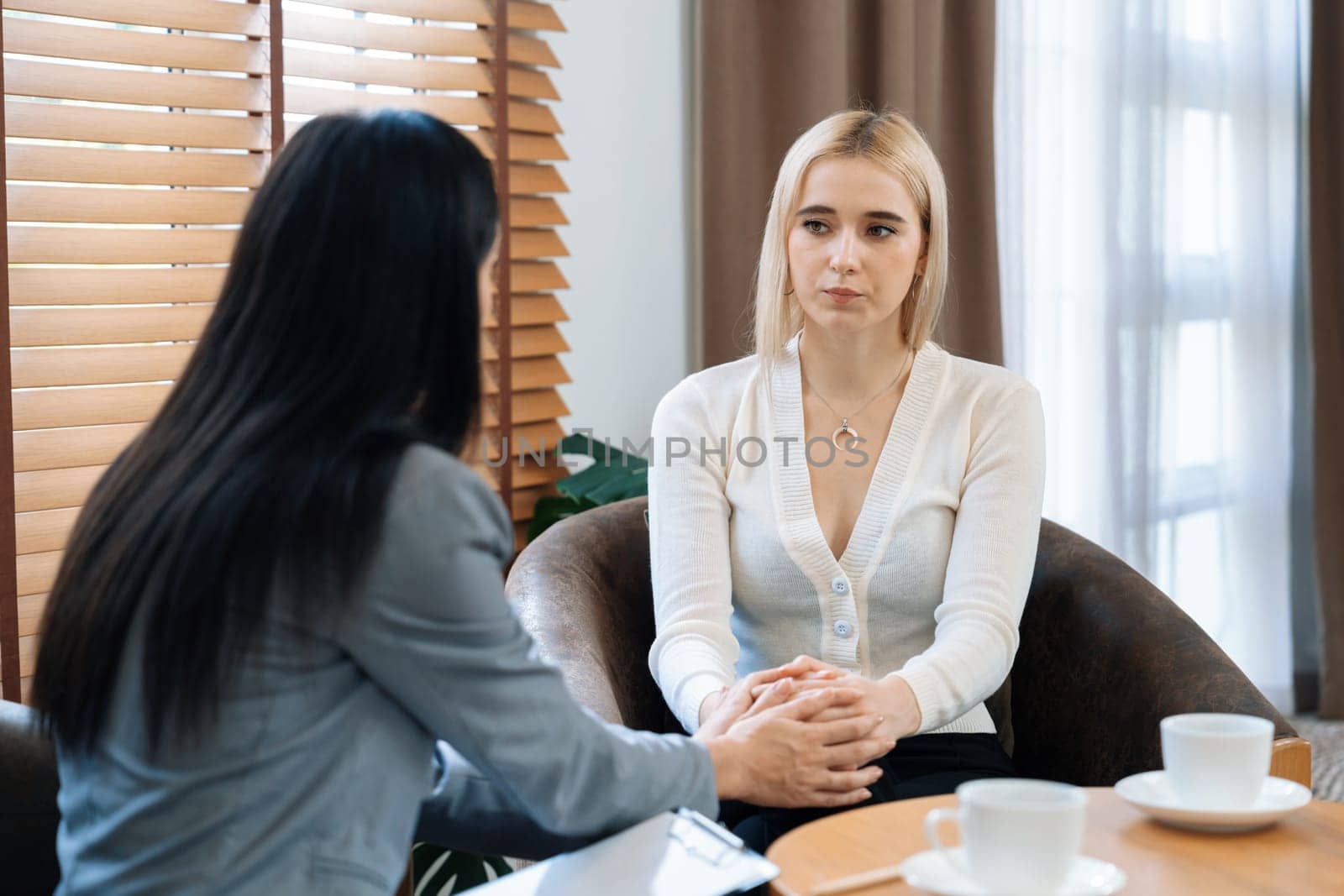 Psychological consultation on mental health or seeking help from professional, young patient on therapy session while psychiatrist making diagnostic on mental illness. Mental treatment session. Blithe