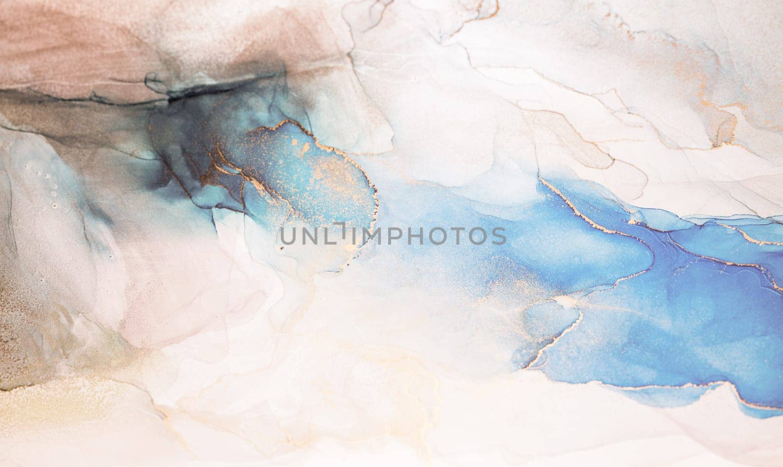 A close-up view of an abstract painting featuring swirling blue and gold hues against a white background. The artwork resembles a sky, water, or other natural element.