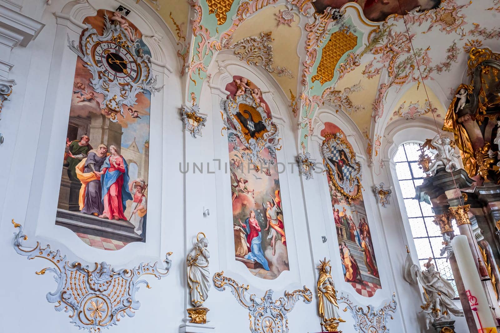 SCHONGAU, BAVARIA, GERMANY, JUNE 01, 2022 : interiors, frescoes and architectural decors of  Schongau church by various anonymous artists, 18th century