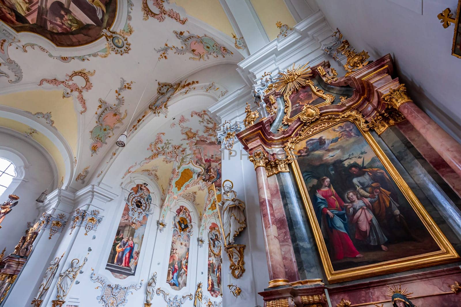 SCHONGAU, BAVARIA, GERMANY, JUNE 01, 2022 : interiors, frescoes and architectural decors of  Schongau church by various anonymous artists, 18th century