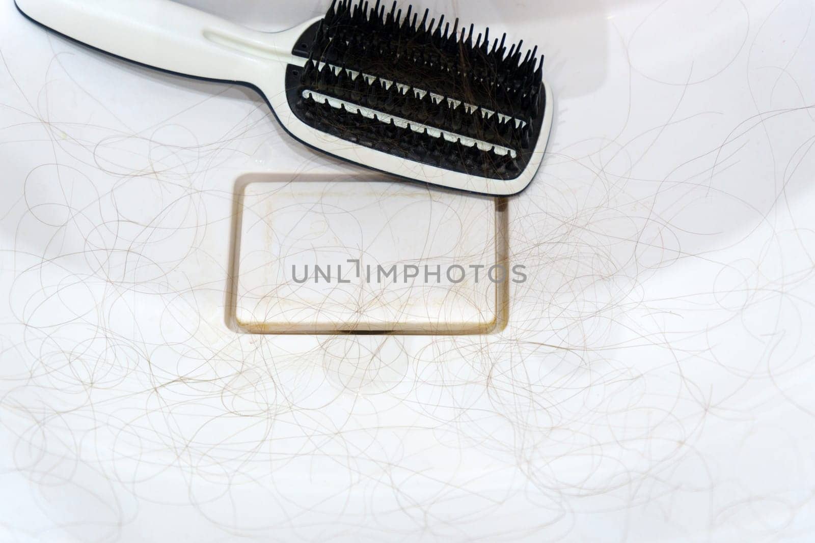 Woman holding bunch hair. Hair loss problem. Healthcare concept. Selective focus