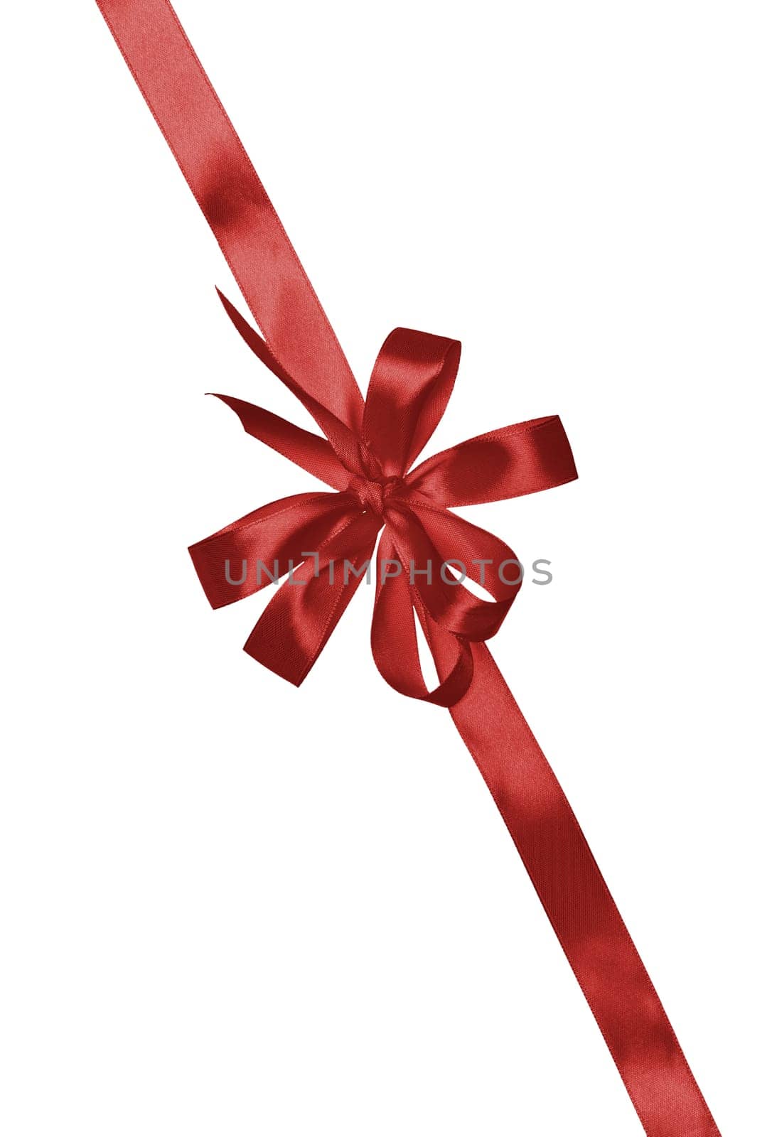 Knotted red silk ribbon in a bow on an isolated background, decor for a gift