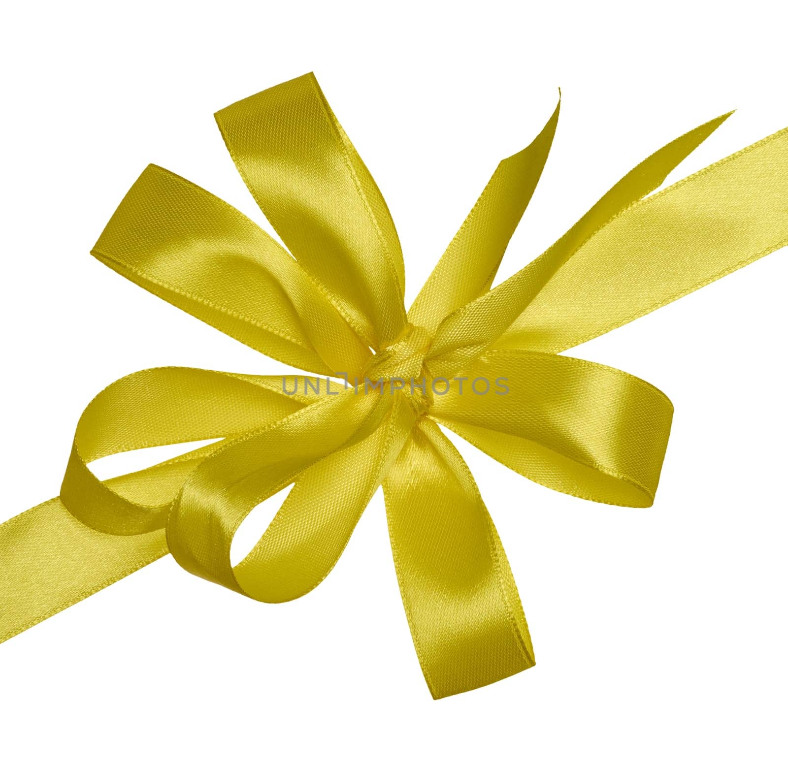 Knotted yellow silk ribbon in a bow on an isolated background, decor for a gift