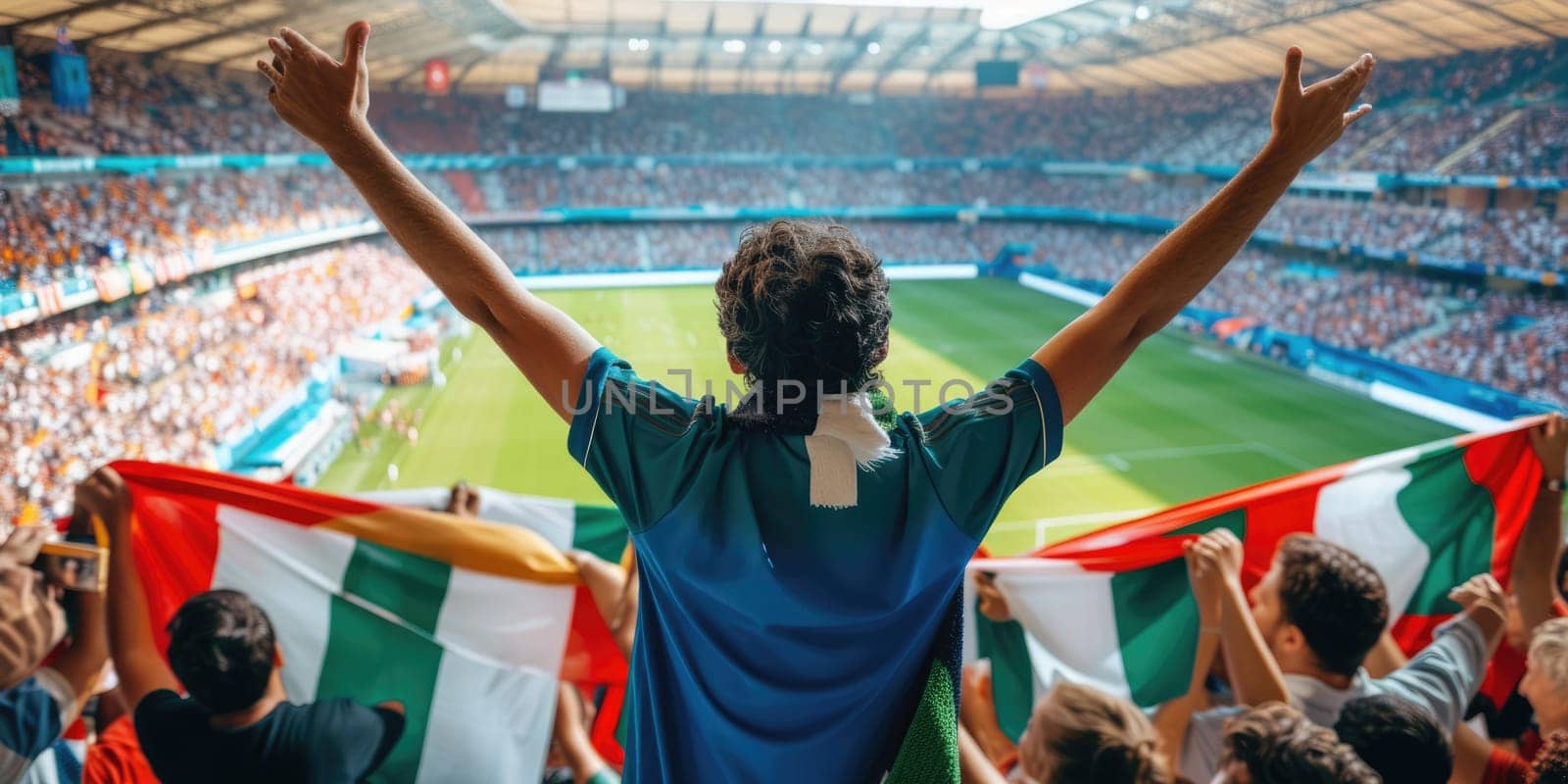 A fan at a soccer match joyfully celebrates a thrilling event, raising his arms in excitement. The Cup match provides entertainment and fun for leisure seekers. AIG41