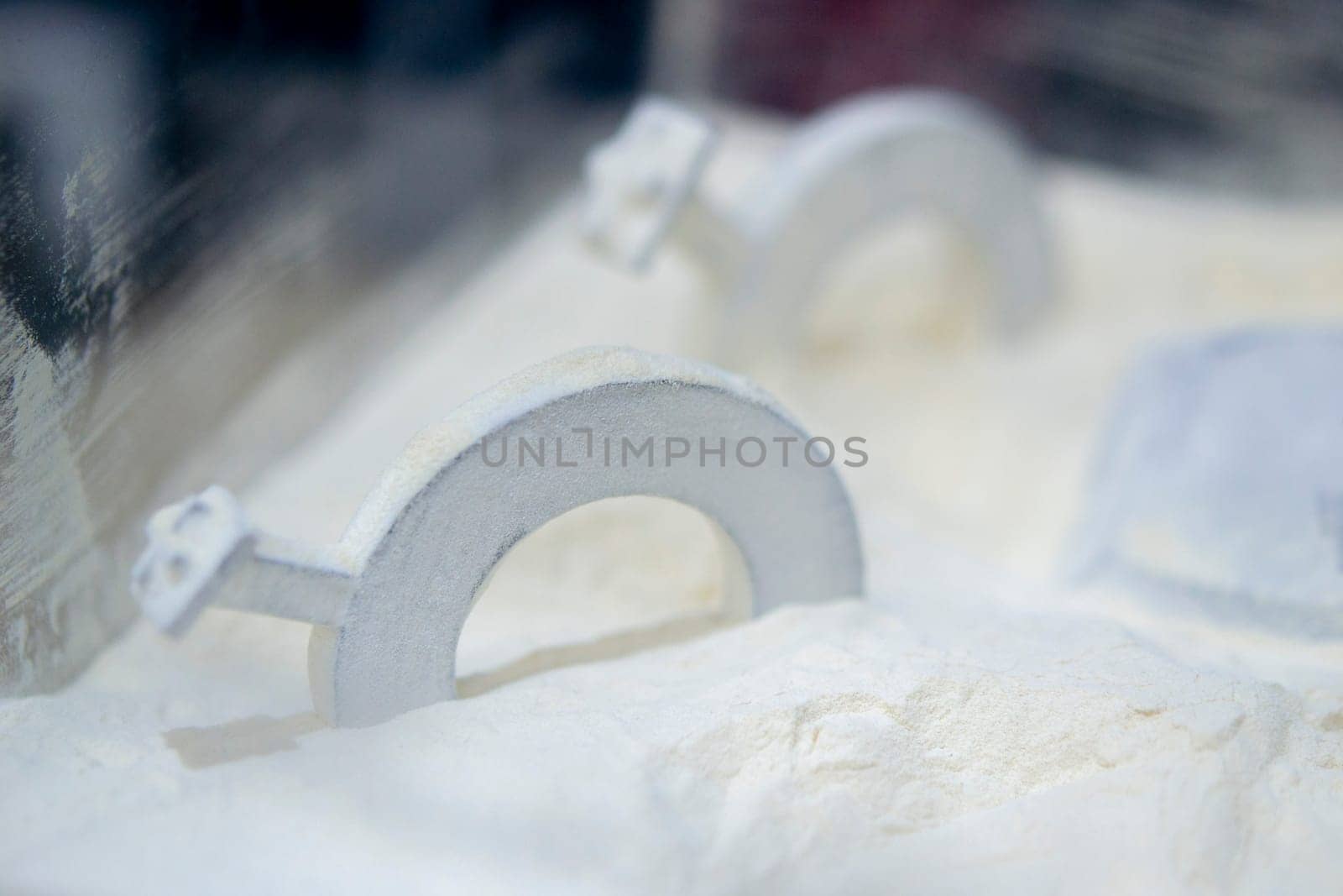 White polyamide powder object on 3D printed from white polyamide powder close-up by Mari1408