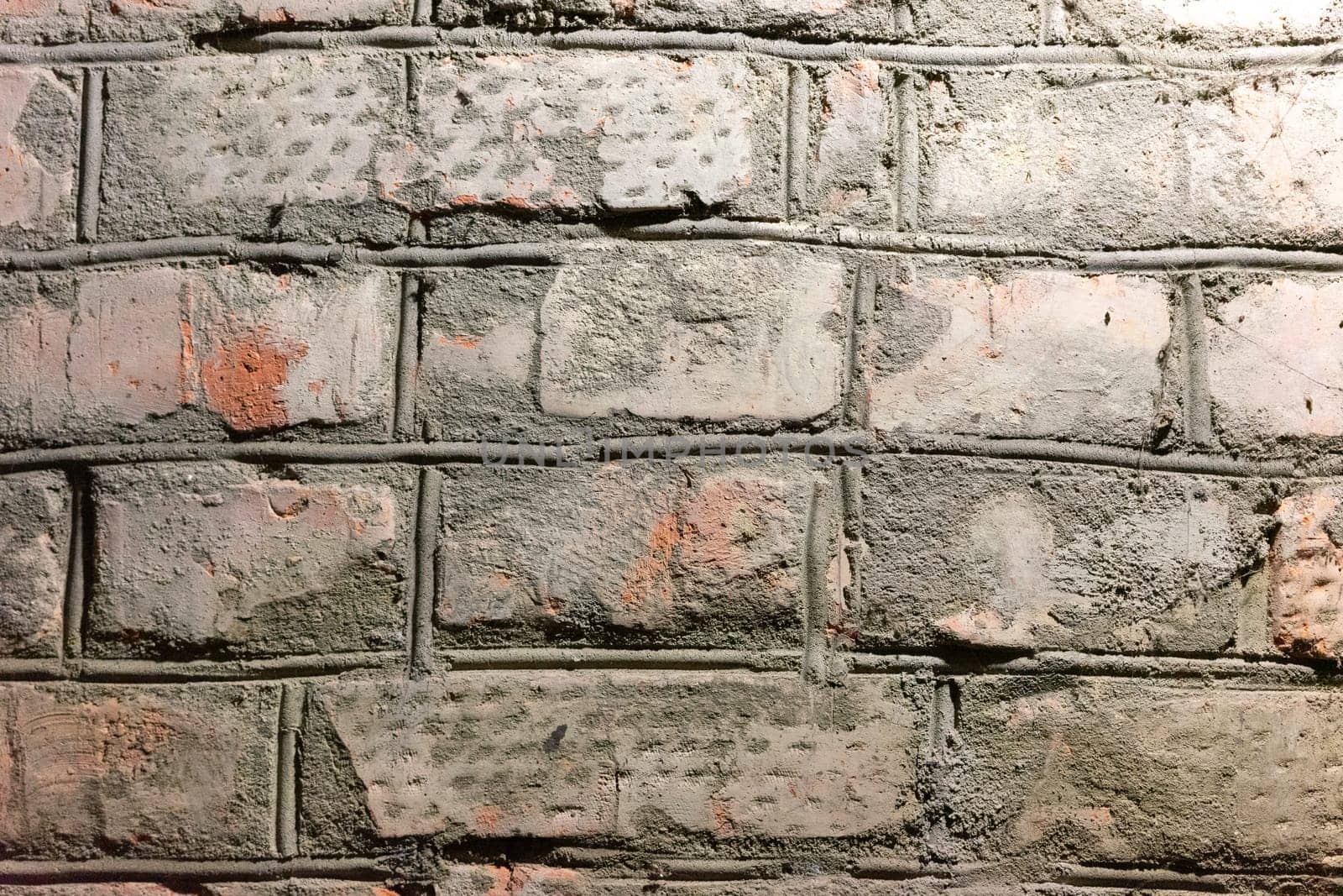 Close-up of a red brick wall.