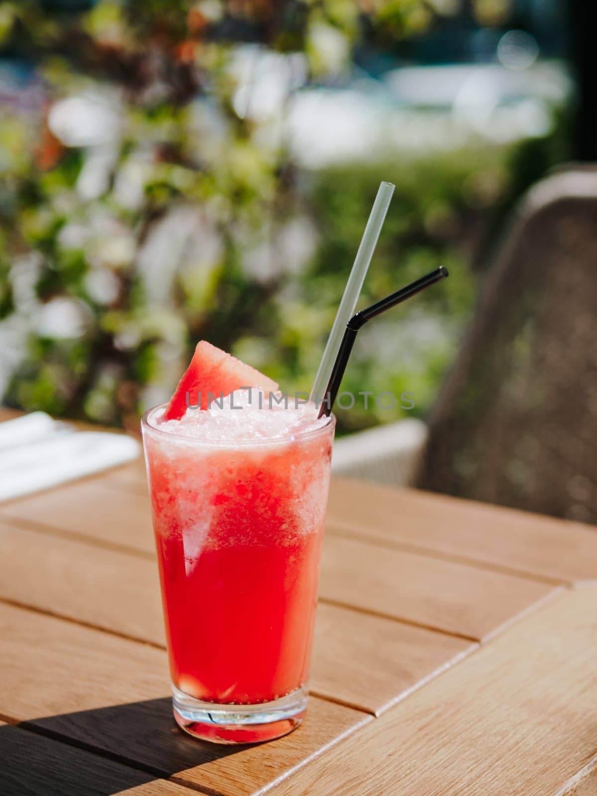 Watermelon drink on table in cafe, summer day by fascinadora