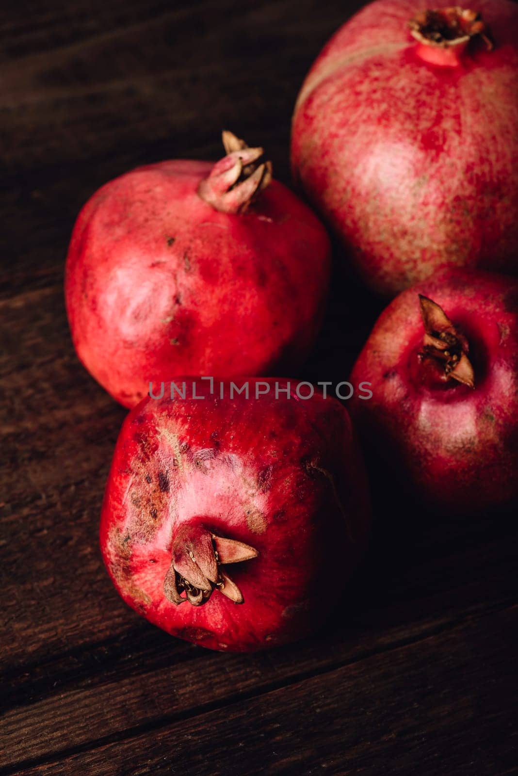 Four ripe pomegranate by Seva_blsv