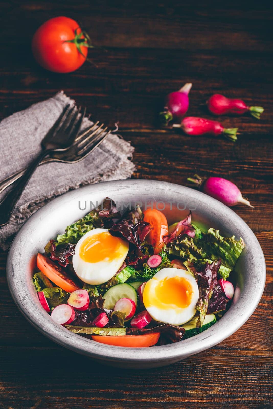 Fresh spring salad with homegrown vegetables and boiled eggs by Seva_blsv