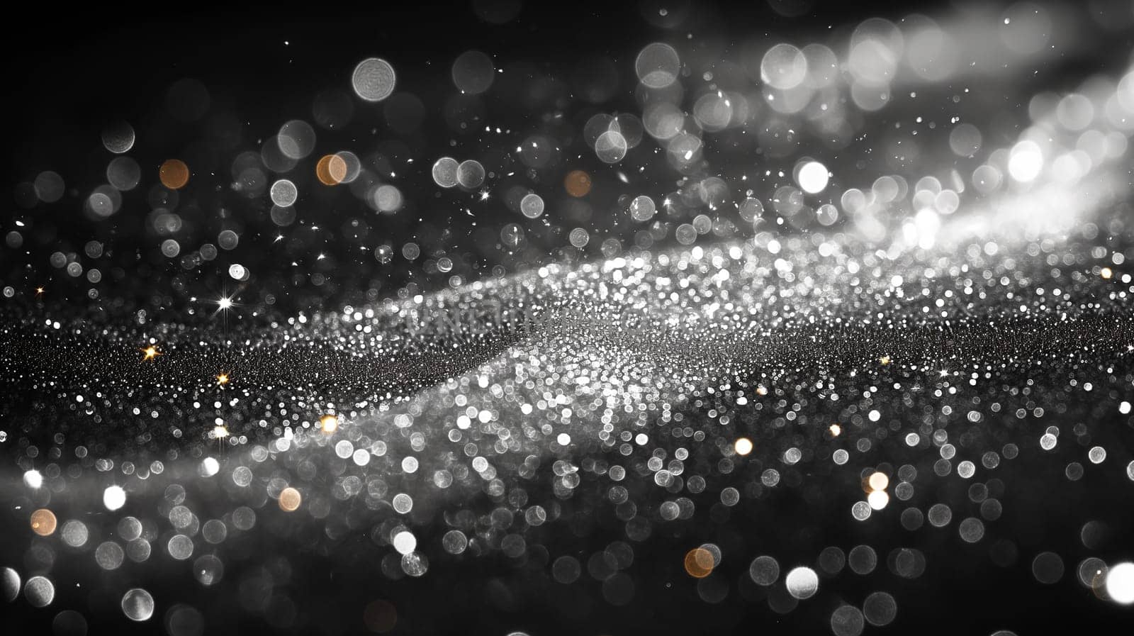 Abstract bokeh background with sparkles, glitter, and twinkle lights creating a shimmer effect