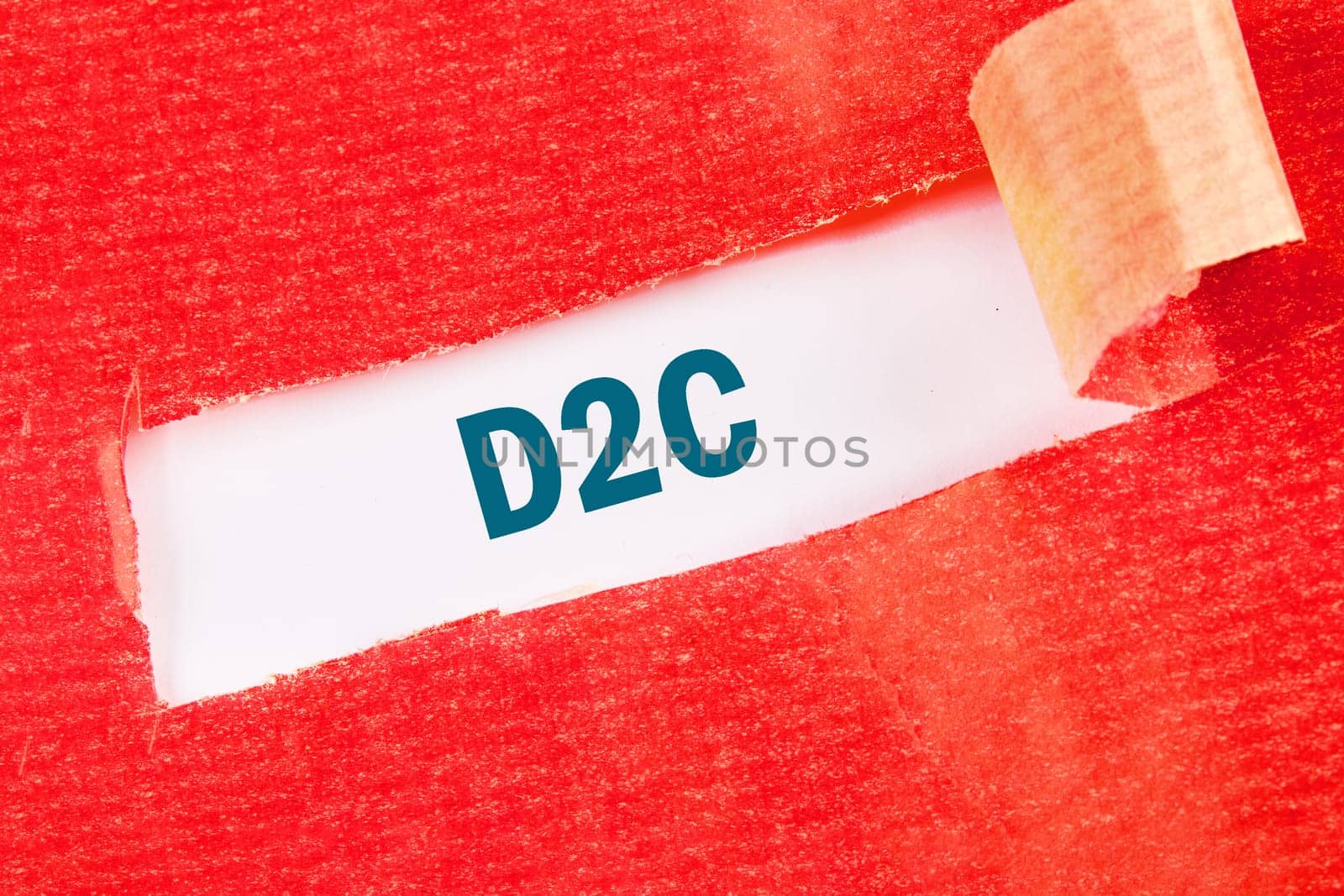 Direct to Consumer D2C.Business concepts. D2C on a white background under torn paper