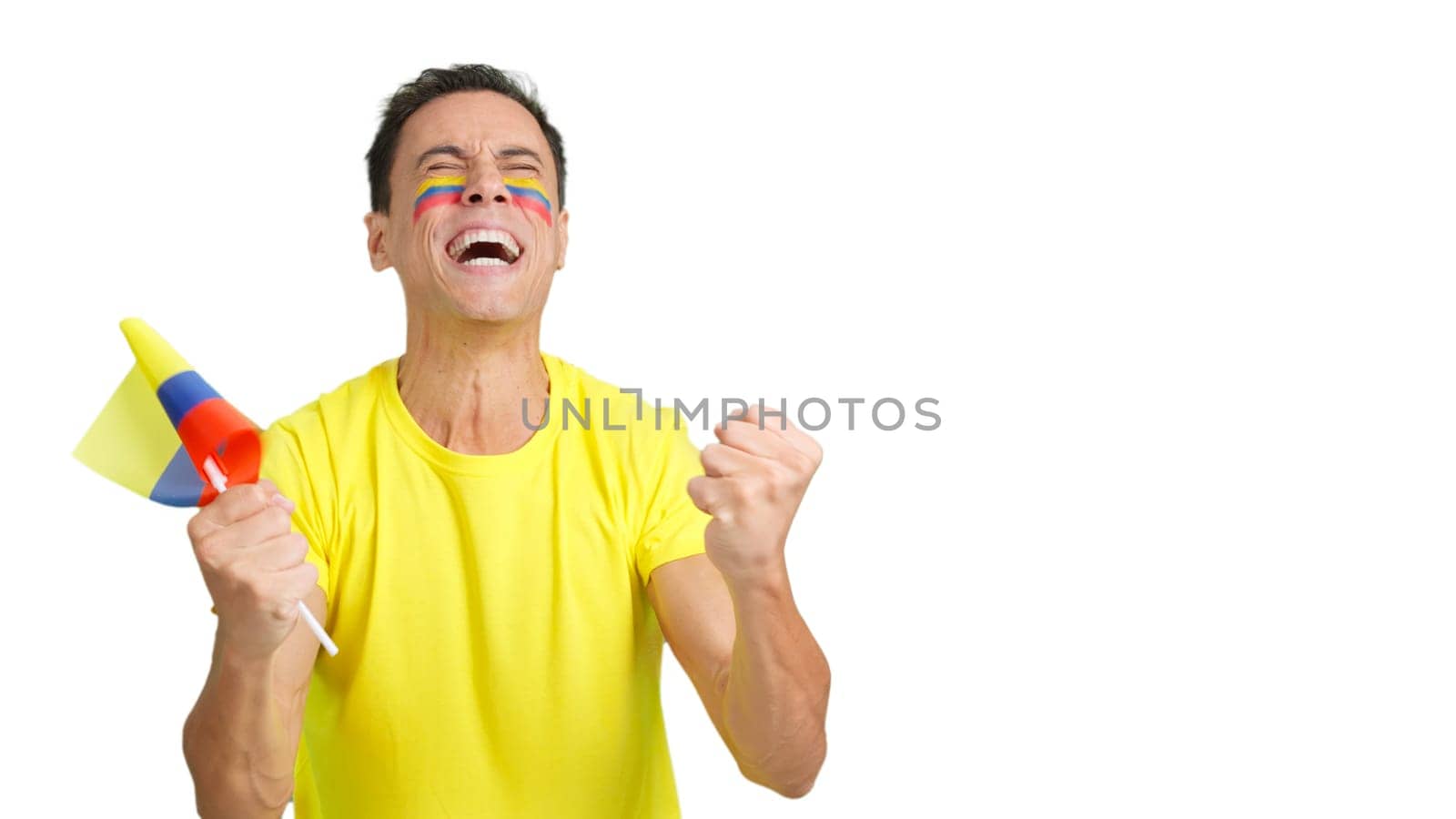 Man passionately cheering for Colombia screaming and waving a national flag